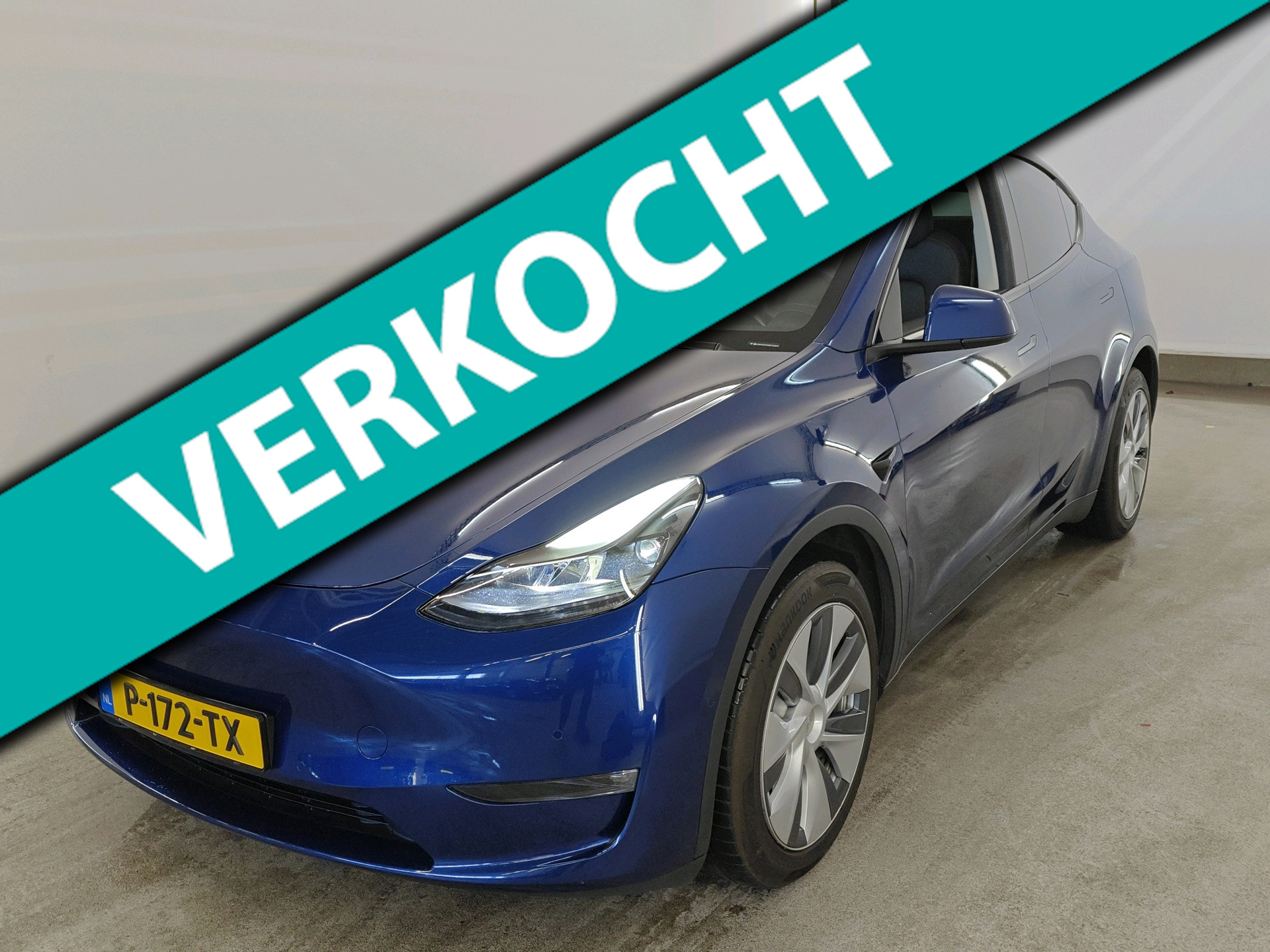 Tesla Model Y 75 kWh 351pk Long Range AWD | SOH 91% | Black Interior | 19" Velgen | Panoramadak | Deep Blue metallic 2022 - voorkant