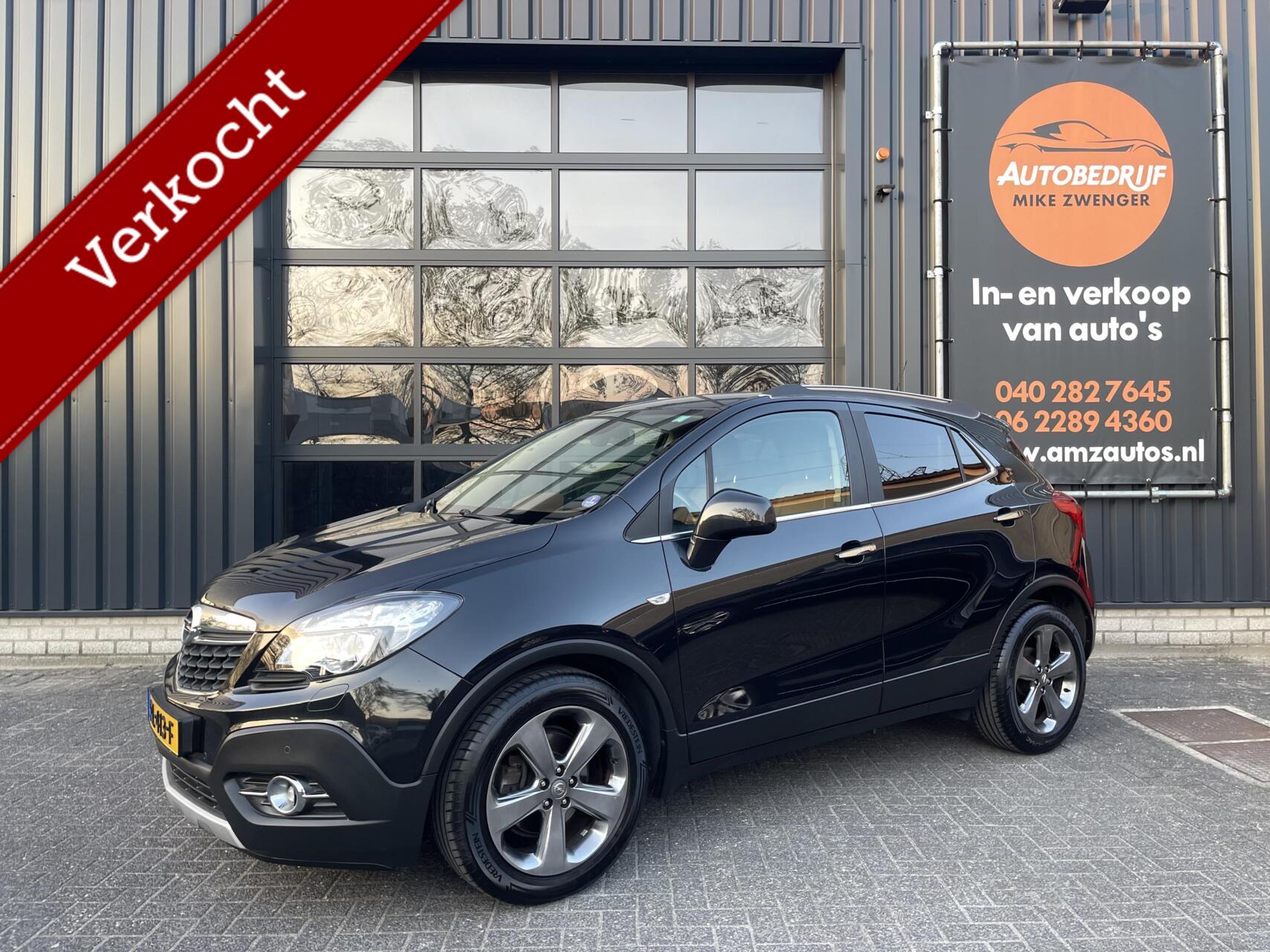Opel Mokka 1.6 Cosmo TREKHAAK|LEER|NAVIGATIE|XENON|CAMERA|STOELVERWARMING 2013 - voorkant