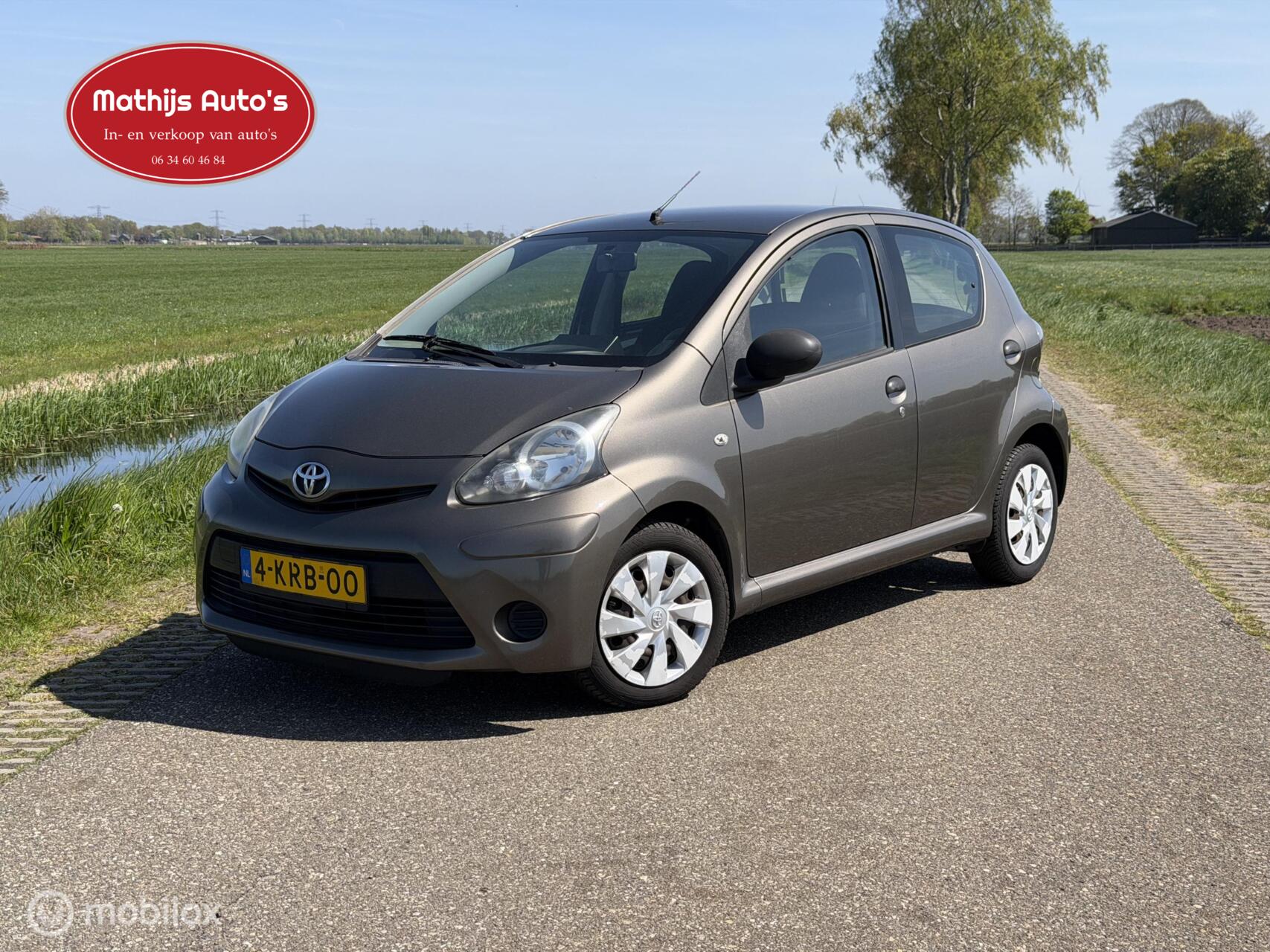 Toyota Toyota Aygo 1.0 VVT-i Comfort Orange Airco! 5 deurs! Nieuwe APK! 2013 - voorkant