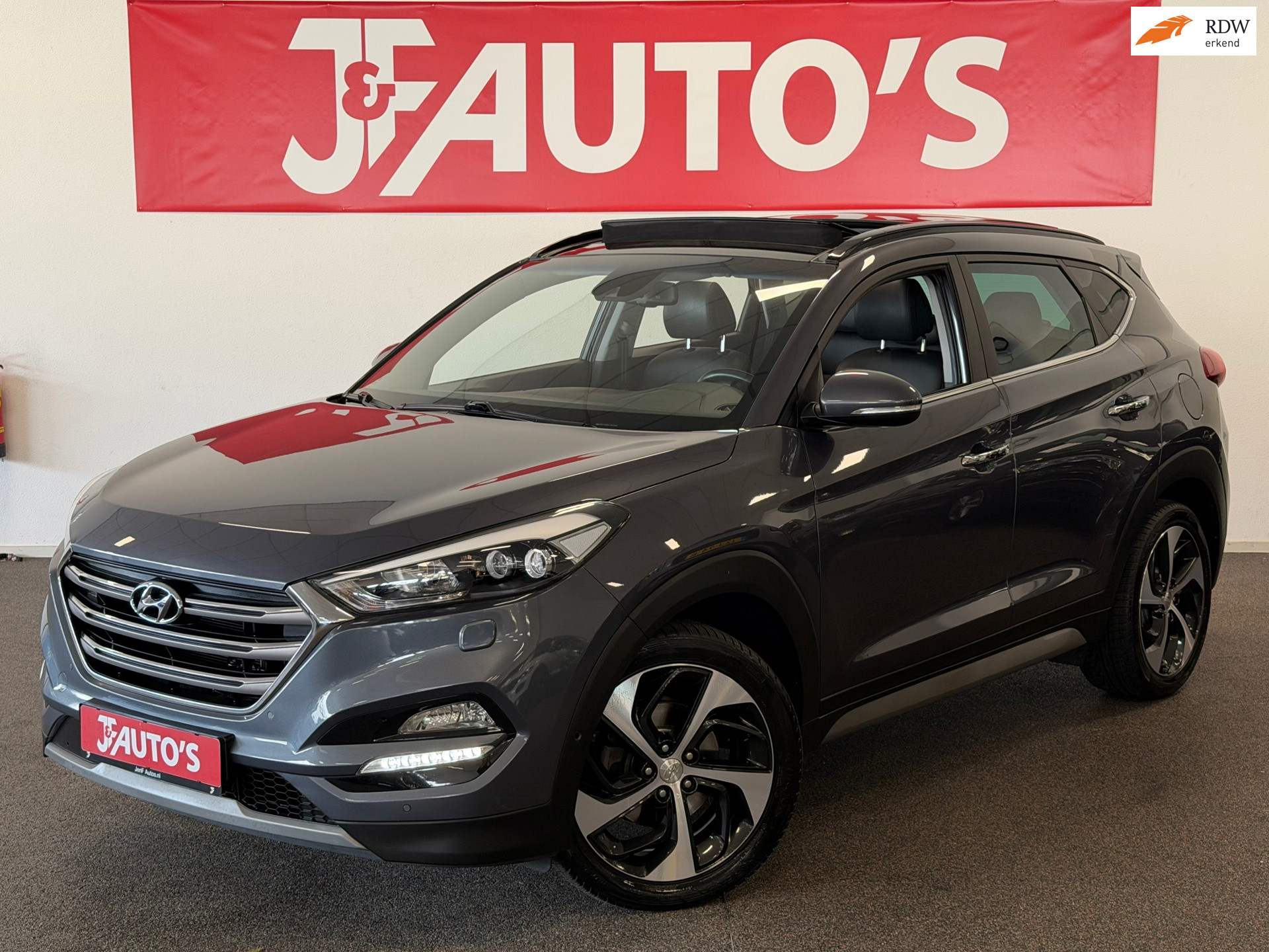 Hyundai Tucson 1.6 T-GDi Premium 4WD |NAVIGATIE|CAMERA|PANORAMA 2018 - voorkant