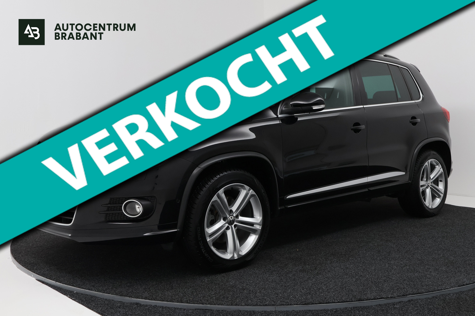 Volkswagen Tiguan 1.4 TSI R-Line Edition Automaat (PANORAMADAK, STOELVERWARMING, CAMERA, CARPLAY, XENON) 2016 - voorkant