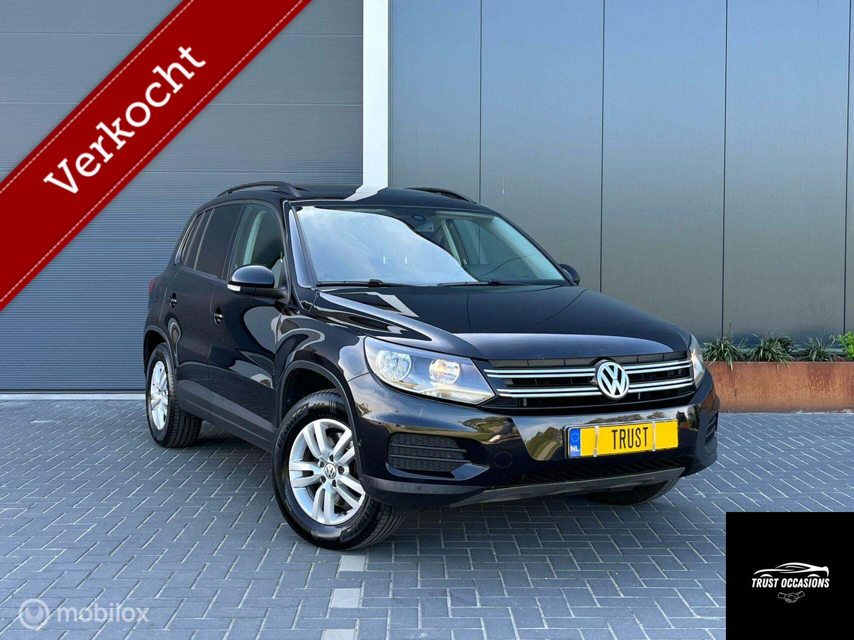 Volkswagen Tiguan 1.4 TSI PANO TREKHAAK PDC LEER NAVI NAP APK 2013 - voorkant