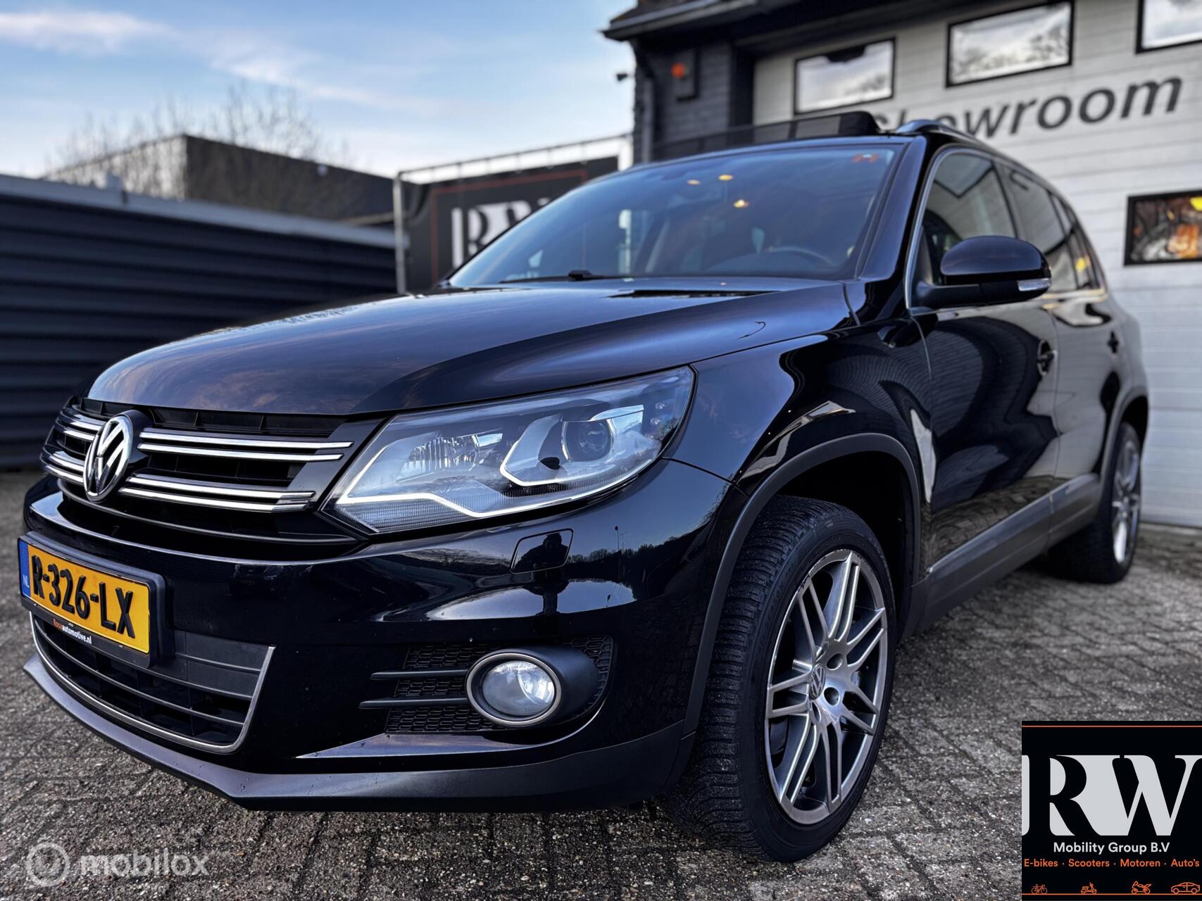 Volkswagen Tiguan 1.4 TSI Sport&Style 4Motion *PANO*CRUISE* 2013 - voorkant