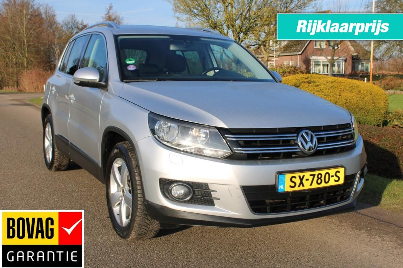 Volkswagen Tiguan 1.4TSI 122pk Sport&Style ECC/cruise/navi/PDC/trekhaak 2014 - voorkant