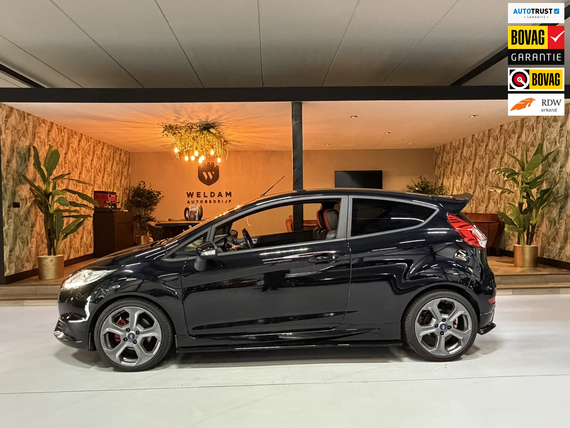 Ford Fiesta 1.6 ST2 *Uniek* Garantie Maxton Pakket Getuned 295PK StoelVW Leder Cruise Airco Led Rijklaar 2016 - voorkant