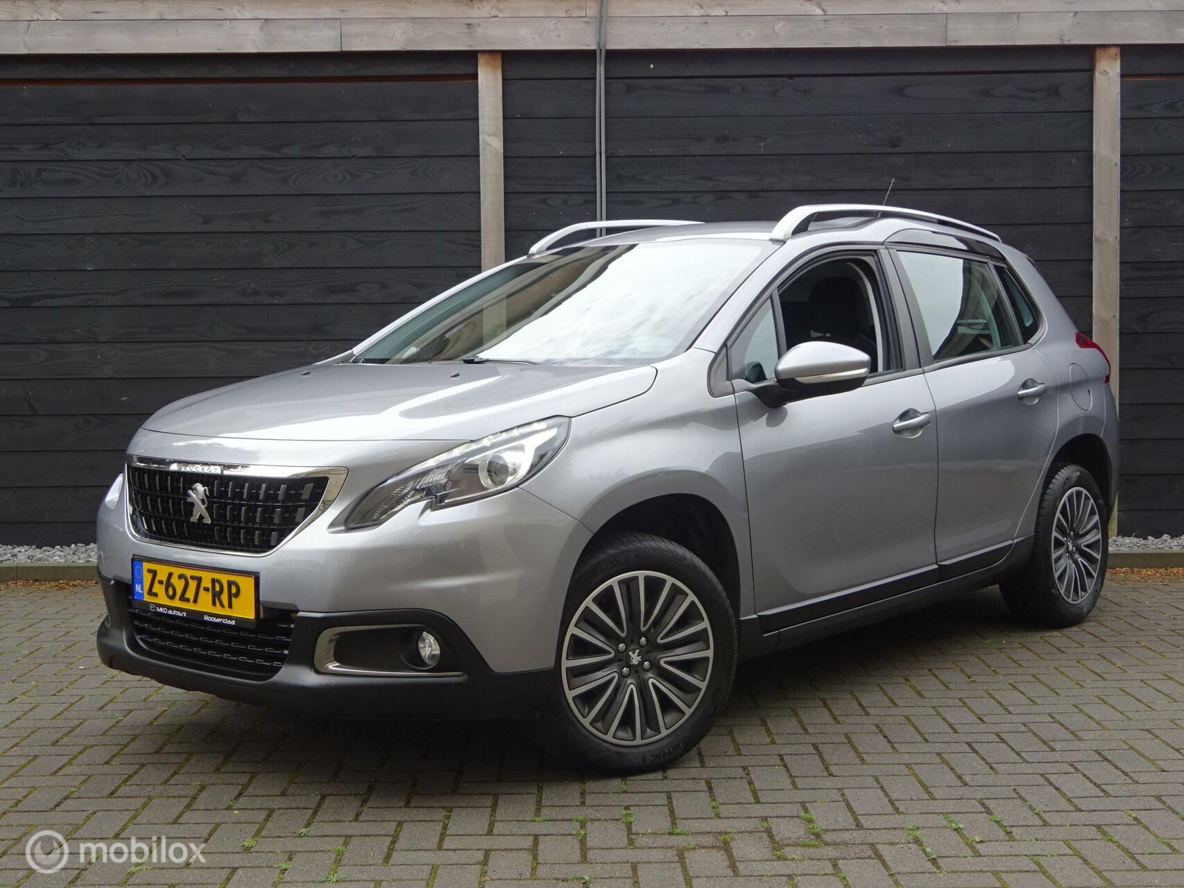 Peugeot 2008 1.2 Airco / FM nav / Carkit / 4 seizoen banden / 82.389 KM!!! 2019 - voorkant