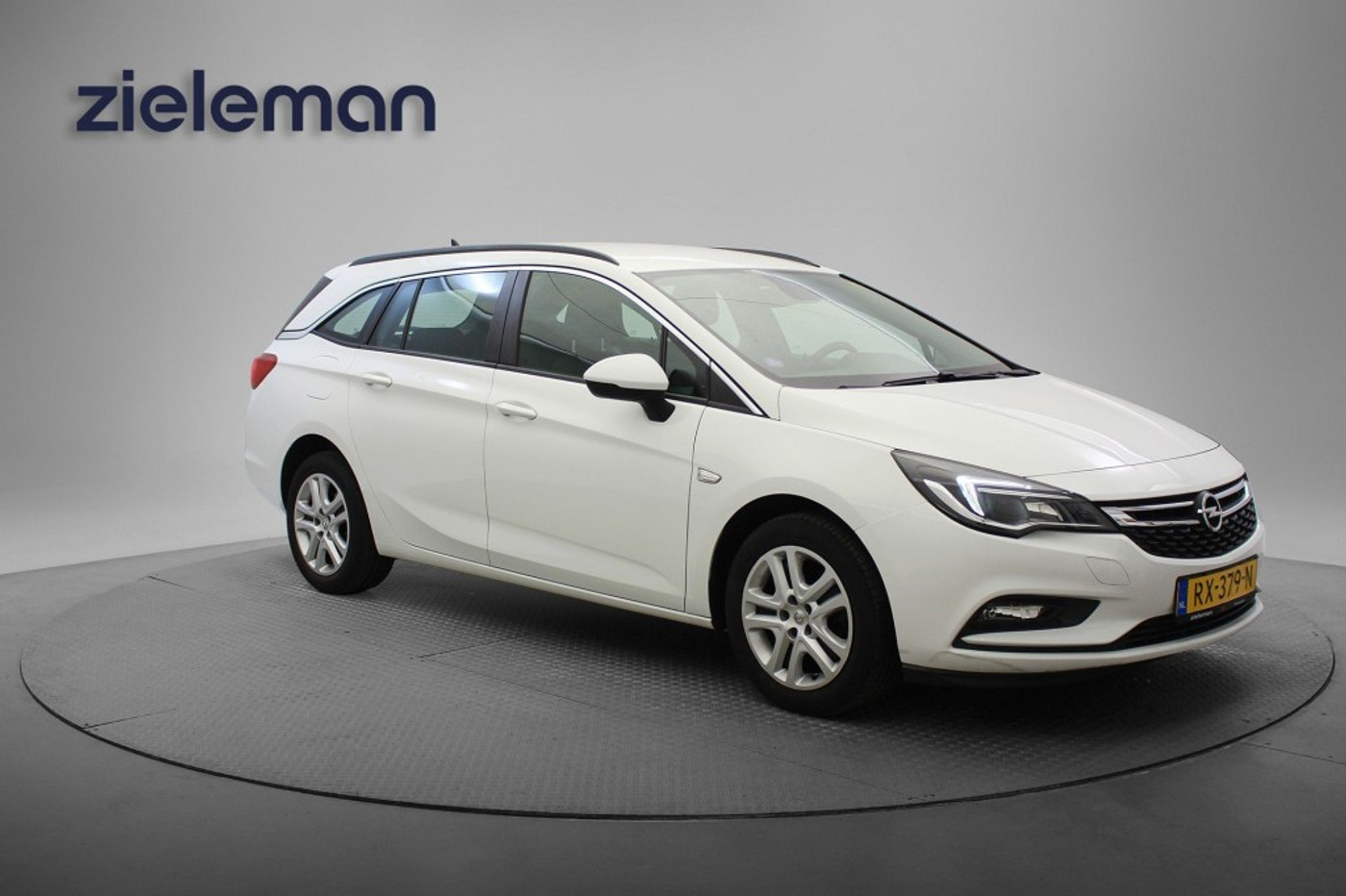 Opel Astra Sports Tourer Sportstourer 1.0 Business + - Carplay, Navi, Trekhaak 2018 - voorkant