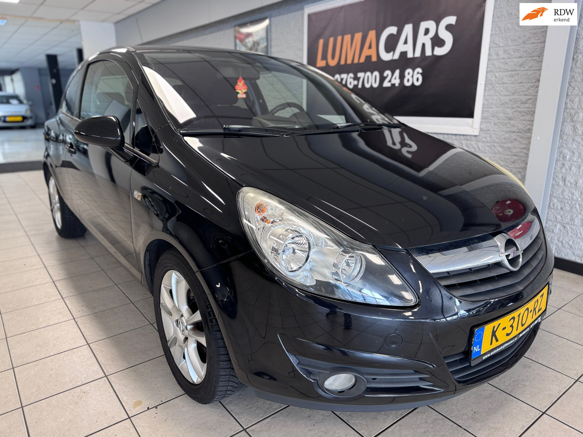 Opel Corsa 1.4-16V Sport| Airco| Cruise |Nieuwe APK |Boekjes 2009 - voorkant