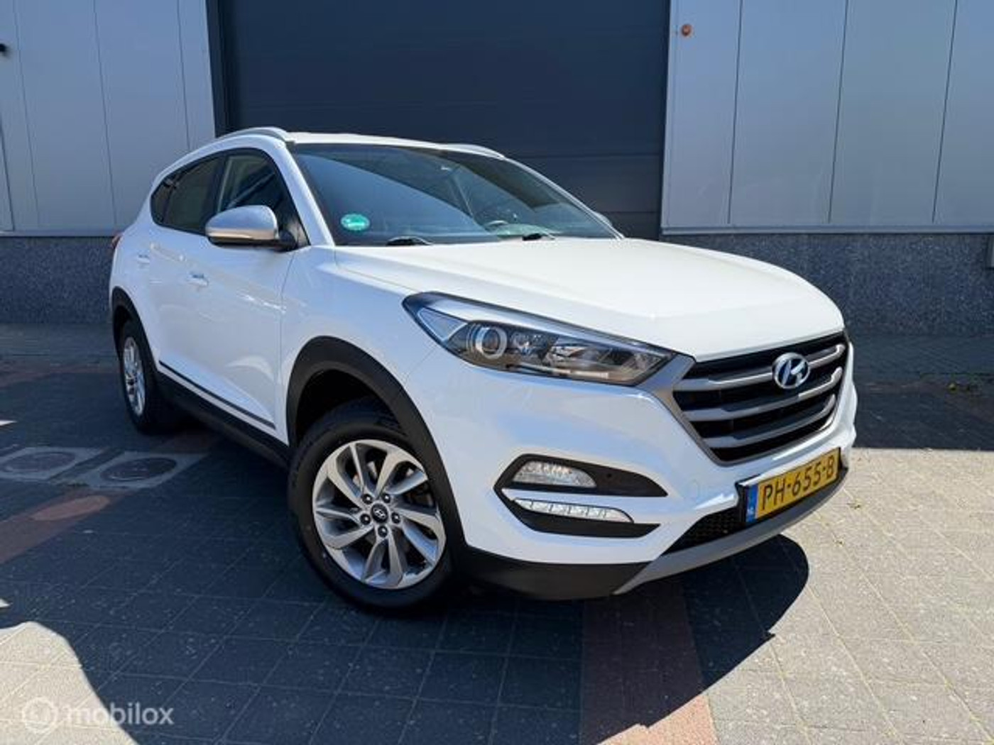 Hyundai Tucson 1.6 GDi Navigatie Cruise cont Stoelverw Trekh 2017 - voorkant