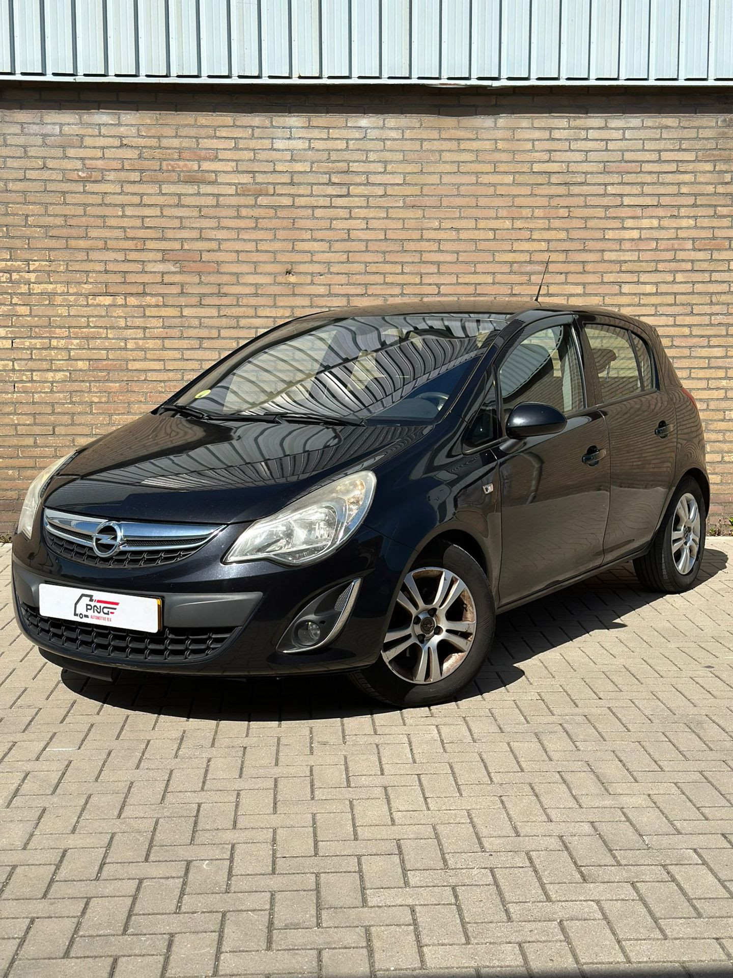 Opel Corsa 1.3 CDTi EcoFlex S/S Cosmo AIRCO - CRUISE - BLEUTOOTH 2011 - voorkant