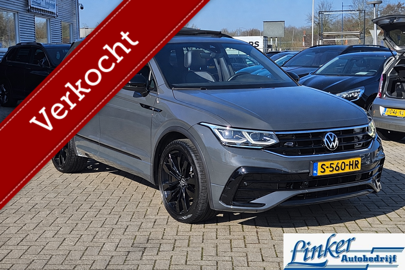 Volkswagen Tiguan 1.5 TSI R-Line BLACK LINE PANO STOELVERW 20INCH DOLPHIN GREY CAMERA 2022 - voorkant