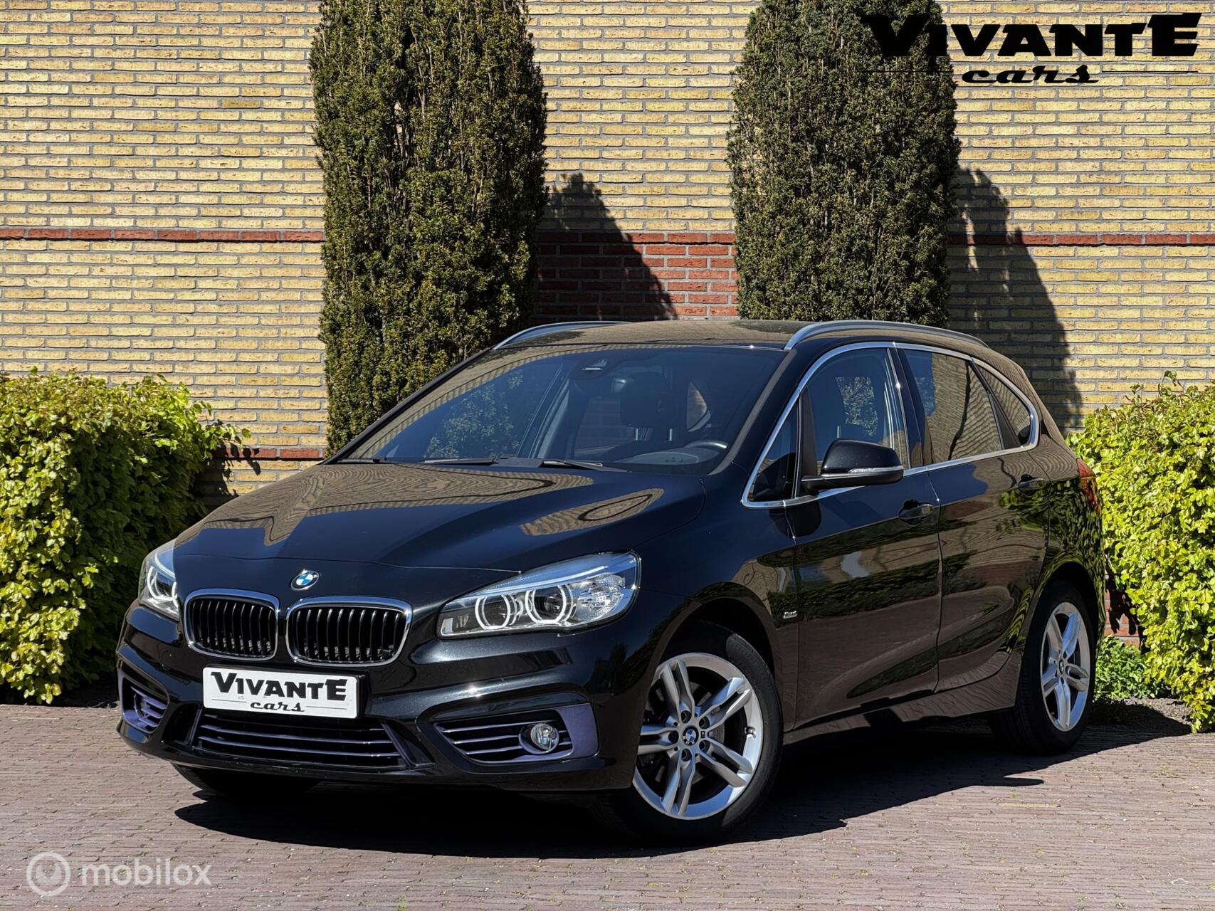 BMW 2-serie Active Tourer 218i Sport AUT. 1e Eig*Dealer.O.H*Cruise*Clima 2016 - voorkant