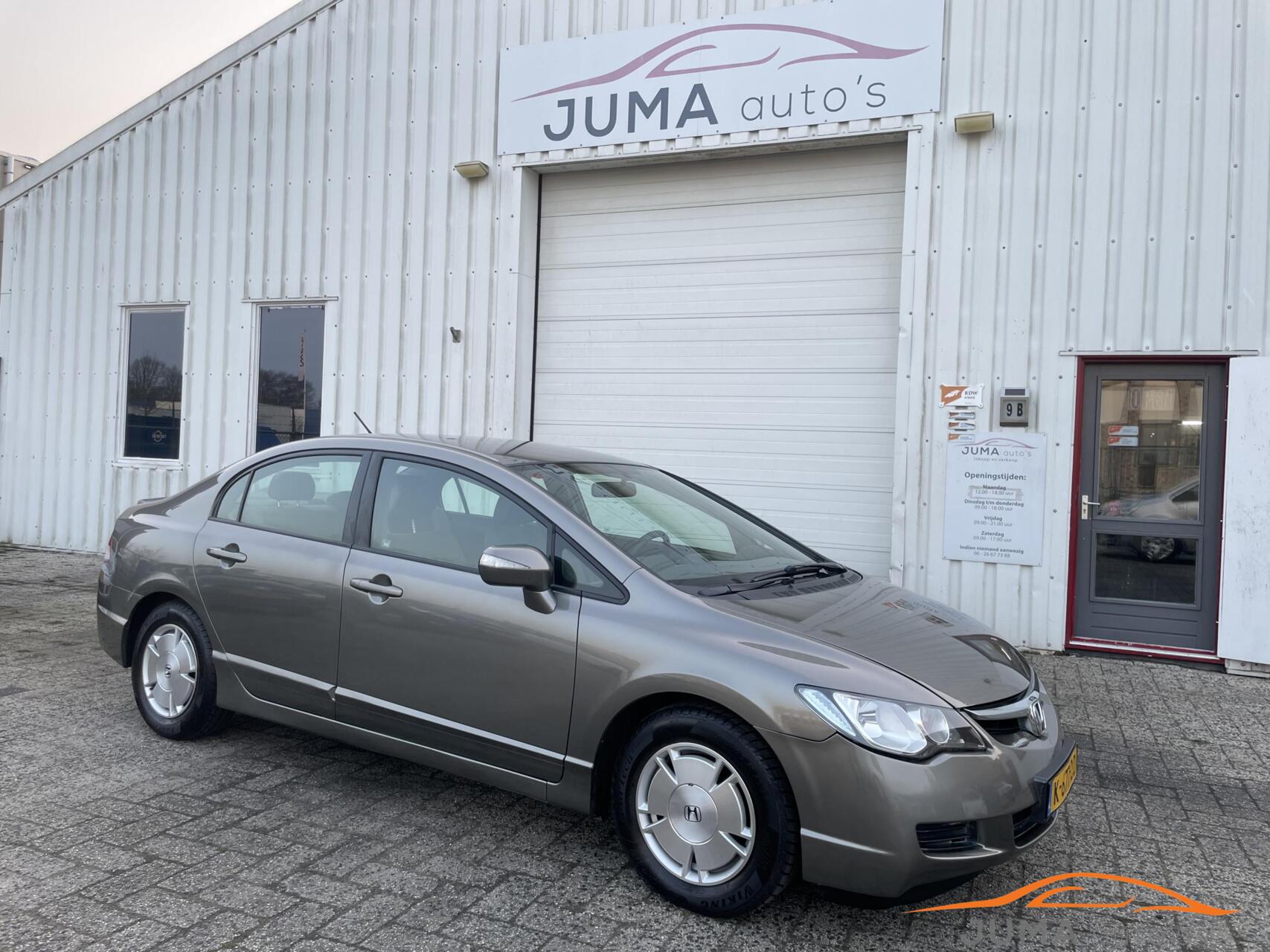 Foto van HONDA CIVIC 4DR HYBRID
