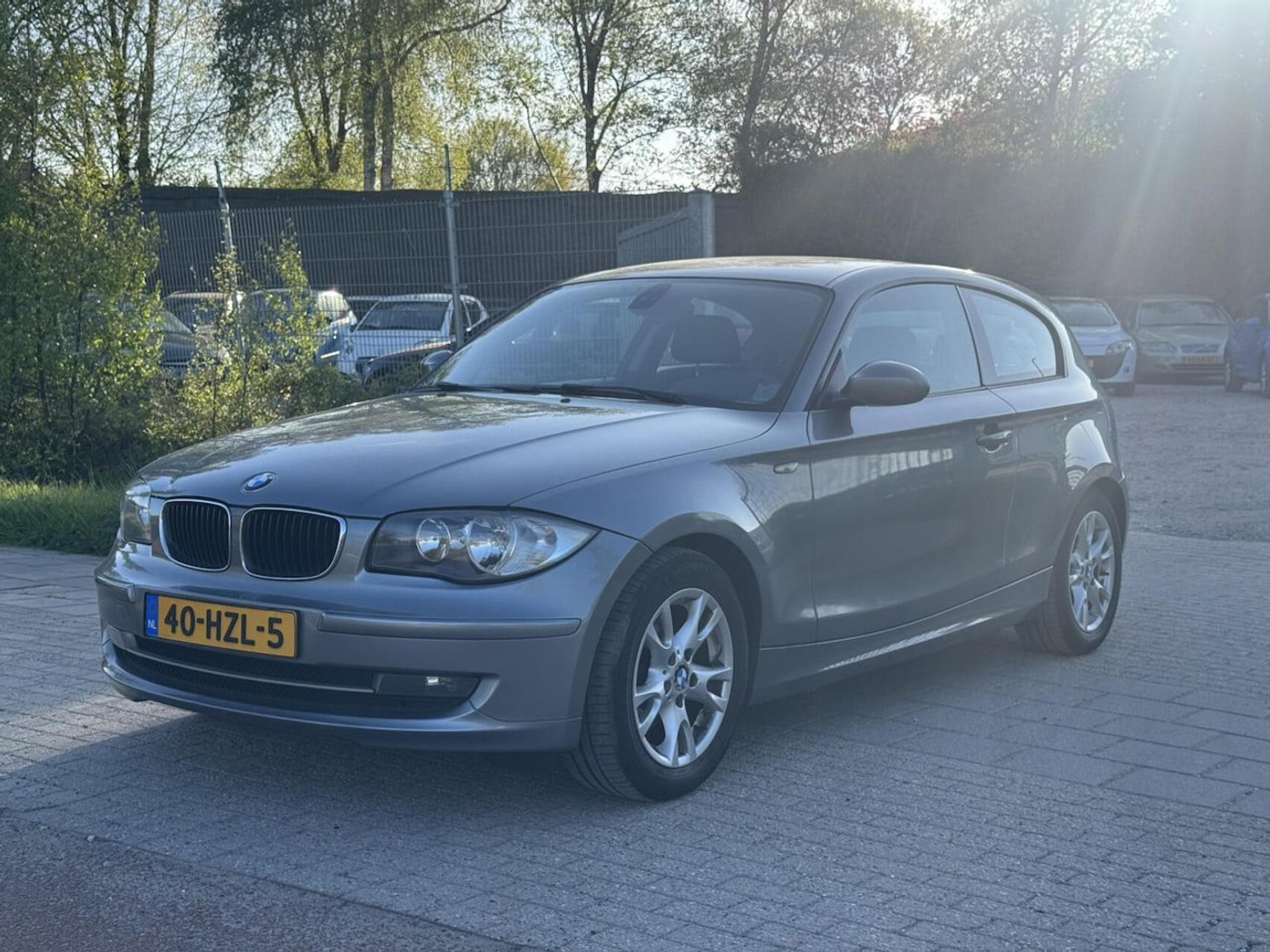 BMW 1er Reihe 116i Business Line 2009 - voorkant