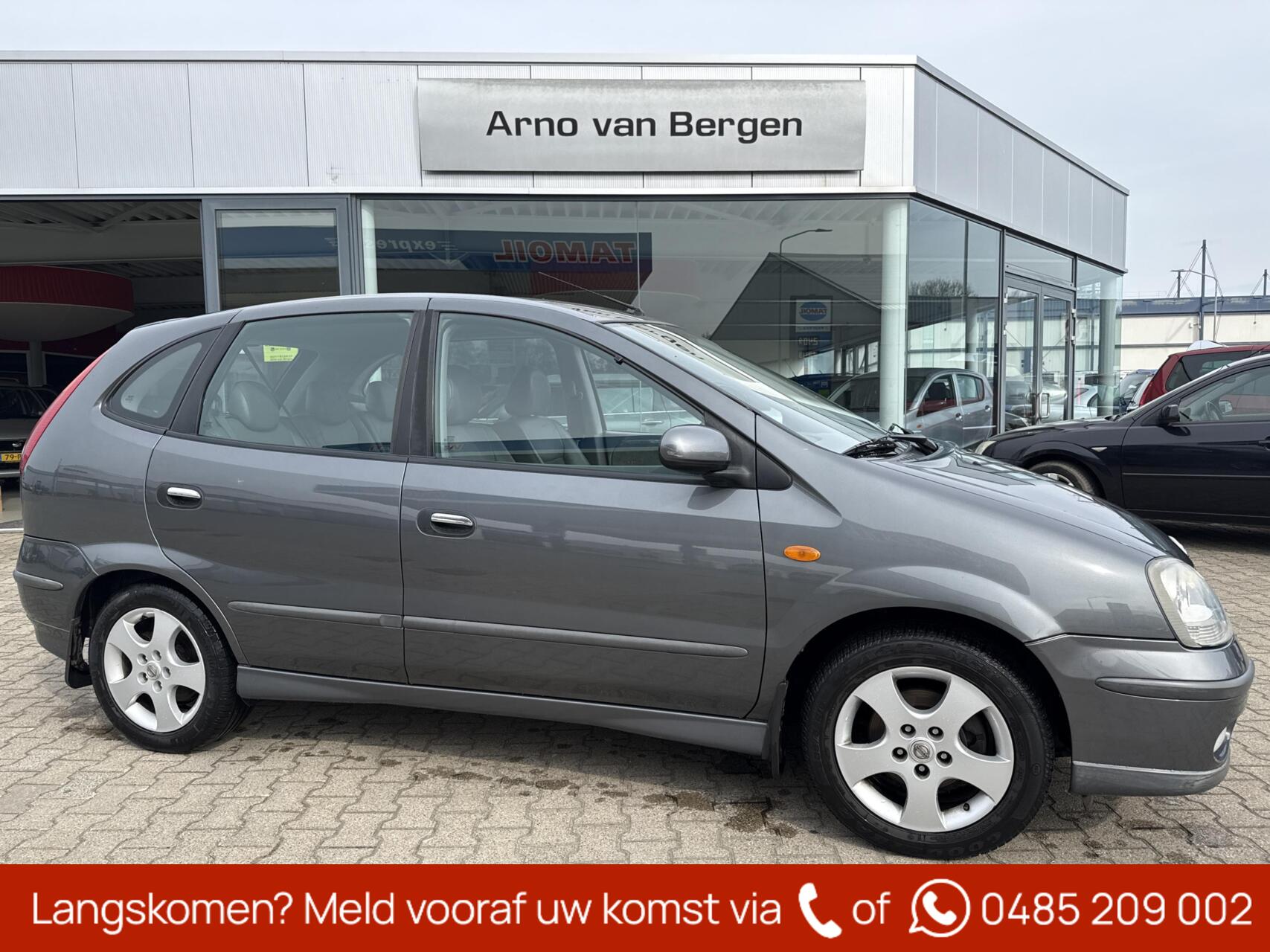 Foto van Nissan Almera Tino