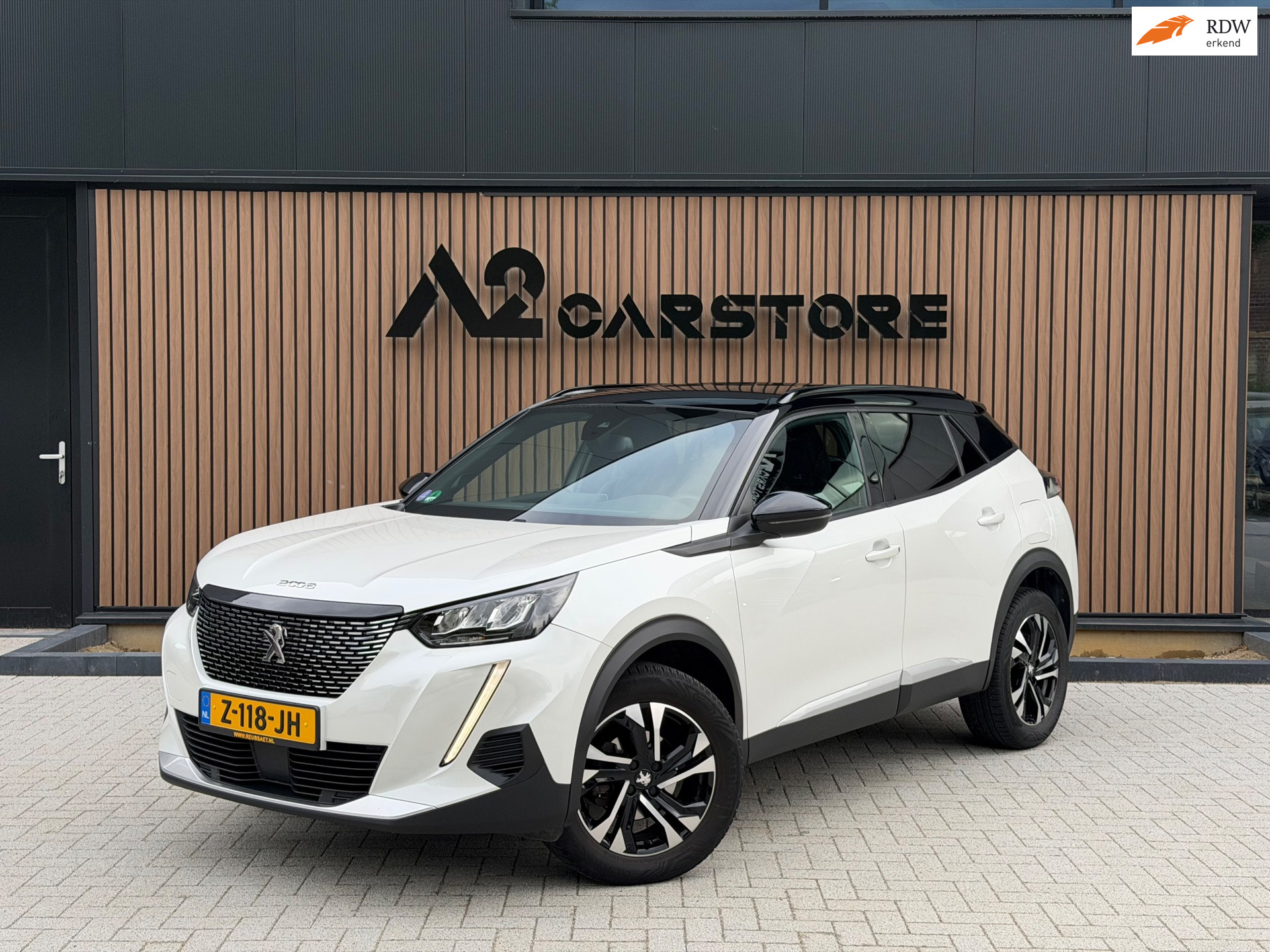 Peugeot 2008 1.2 PureTech Allure Pack AUTOMAAT TREKHAAK CAMERA 2023 - voorkant