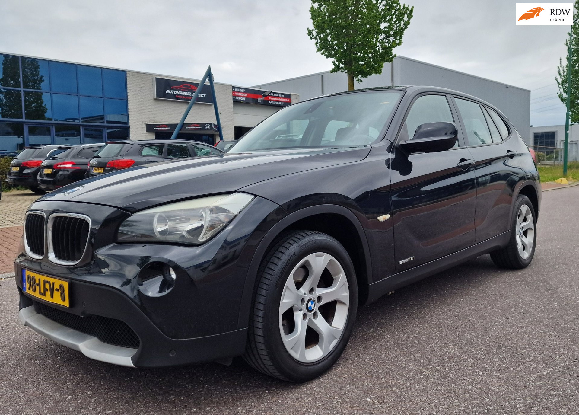 BMW X1 sDrive 18i SDrive18i Executive AUT NAVI PSENSOR CRUISE TREKHAAK 2 X SLEUTELS 2010 - voorkant