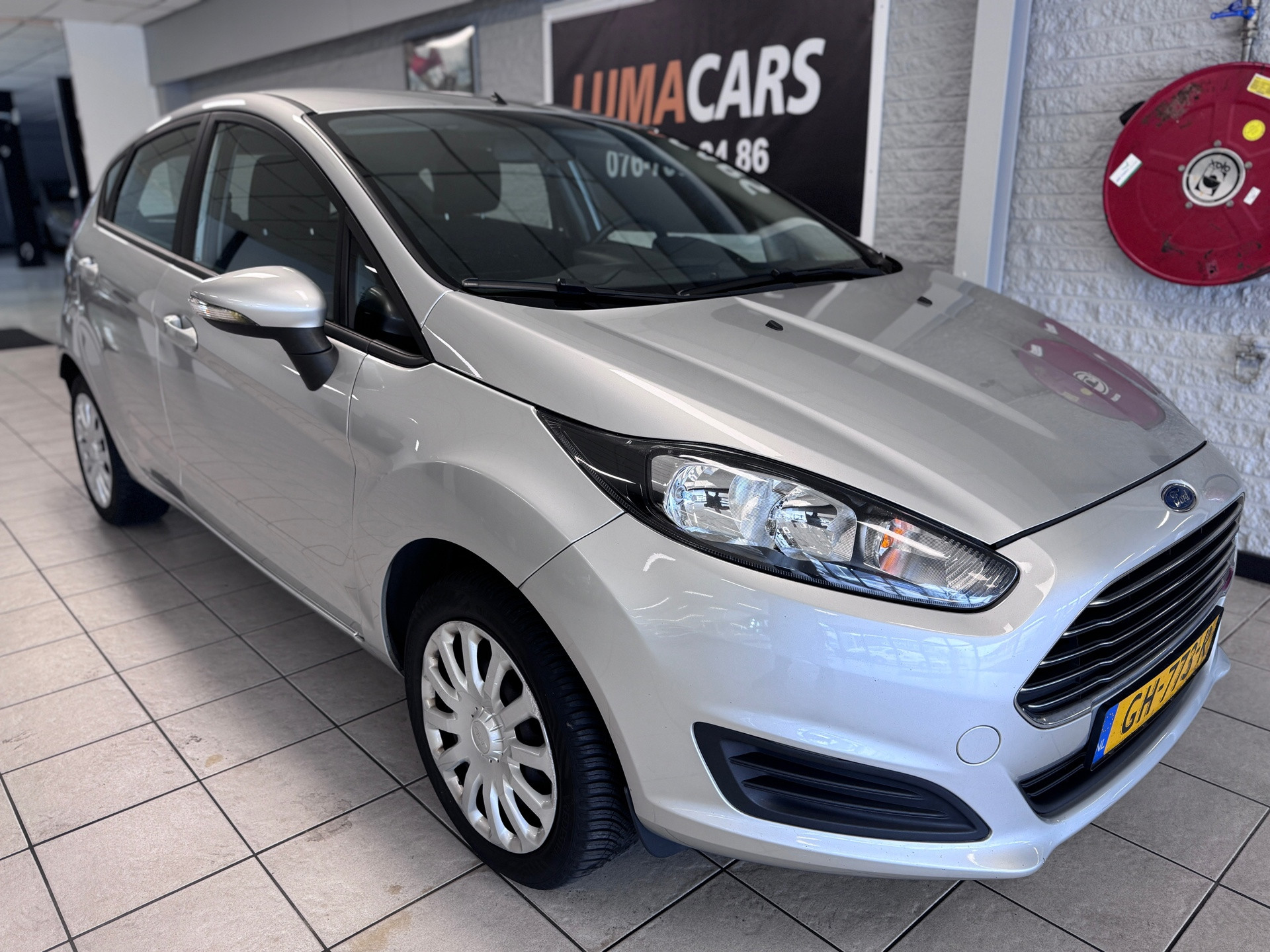 Ford Fiesta 1.0 Style|Airco | 5-deurs |Navi| Onderhoud| 2015 - voorkant
