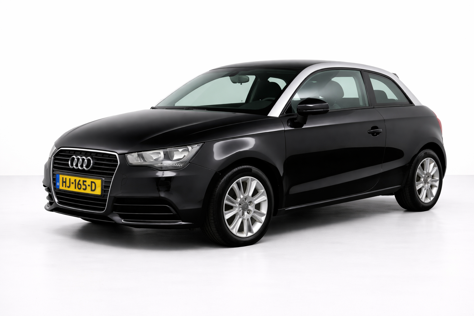 Audi A1 1.6 TDI Ambition Pro Line Business Airco Cruise 2013 - voorkant