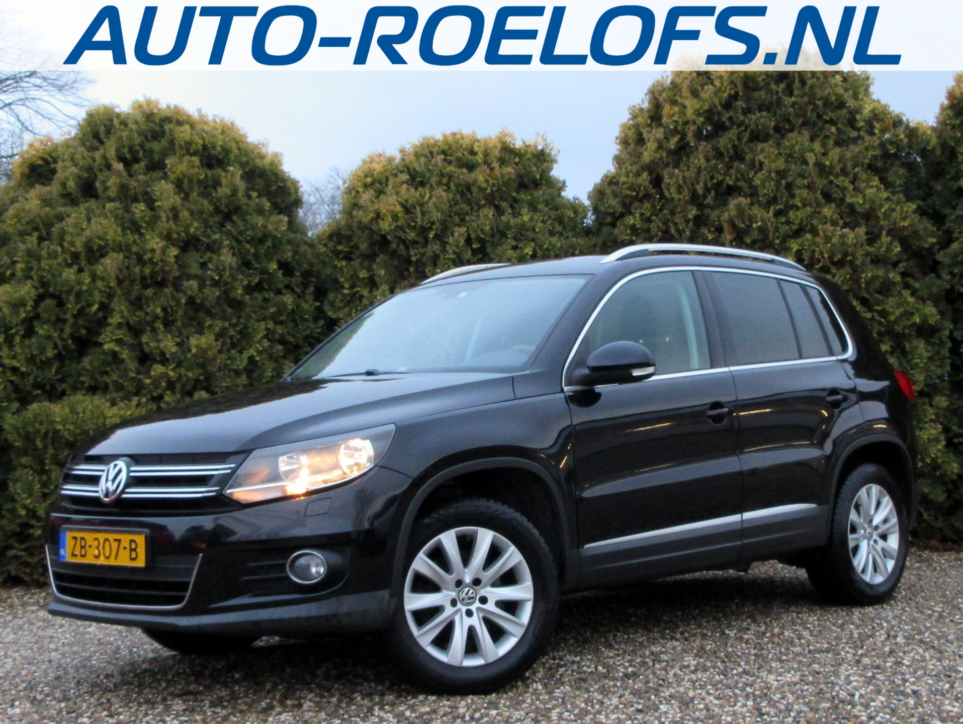 Volkswagen Tiguan 1.4 TSI Sport&Style*Navi*Cruise*Pdc* 2011 - voorkant