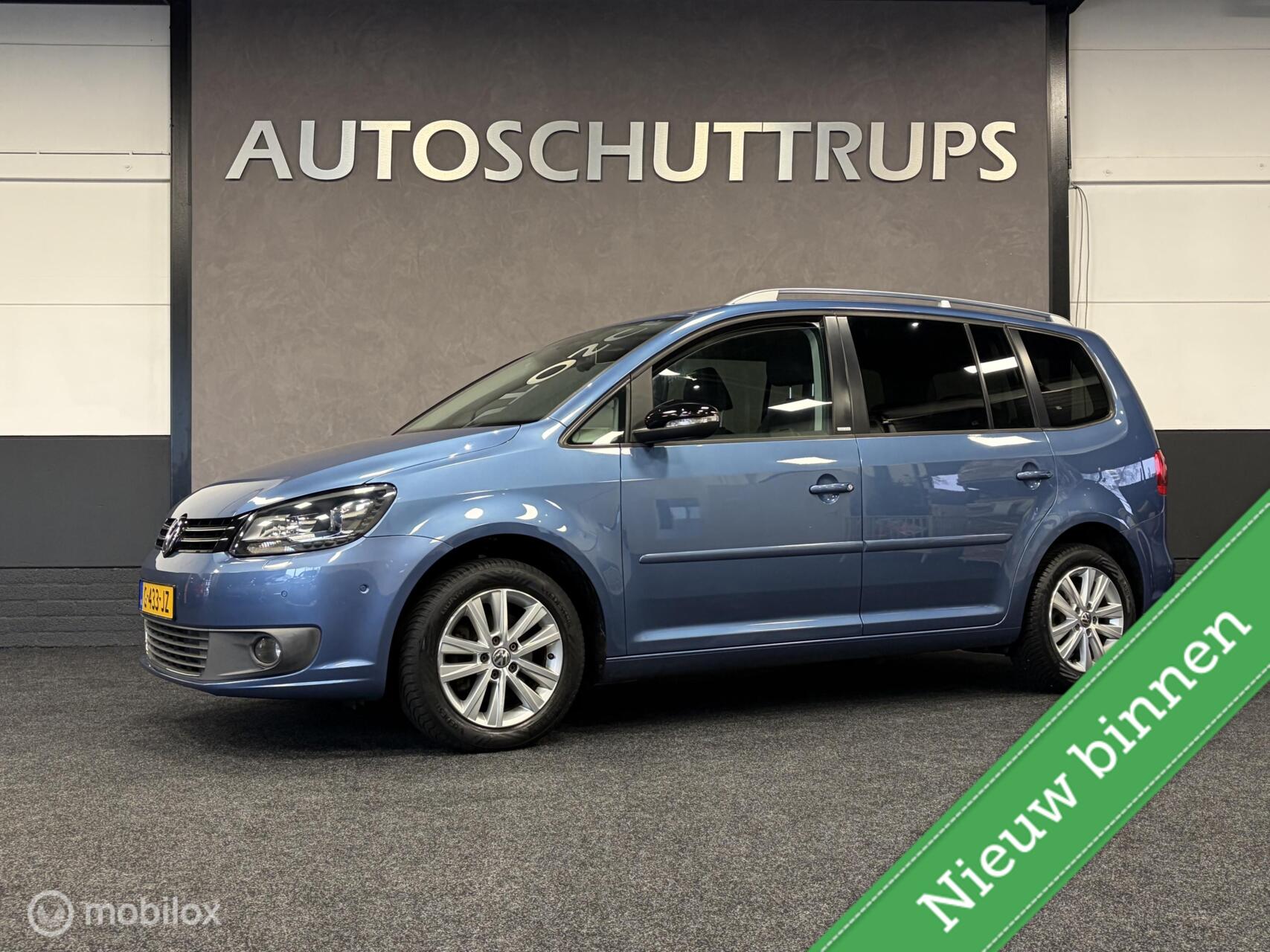 Volkswagen Touran 1.2 TSI Highline STOELVERW. / CLIMA / CRUISE / PDC / LMV / RIJKLAAR! / 2011 - voorkant