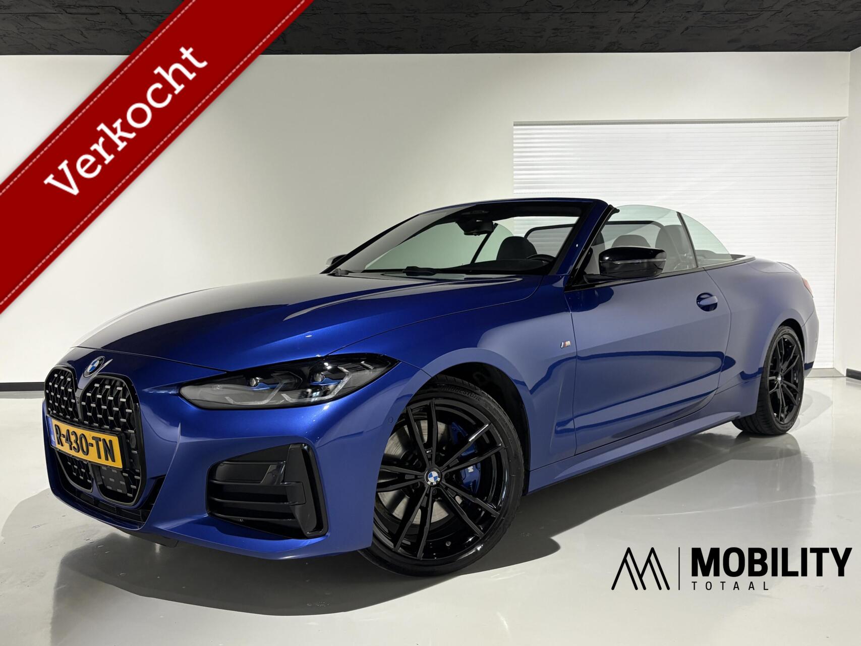 BMW 4-serie Cabrio M440i xDrive 374pk|Laser|CoPilot|H&K|Open-air|Trekhaak|Shadow Line|ACC|Head-up| 2021 - voorkant