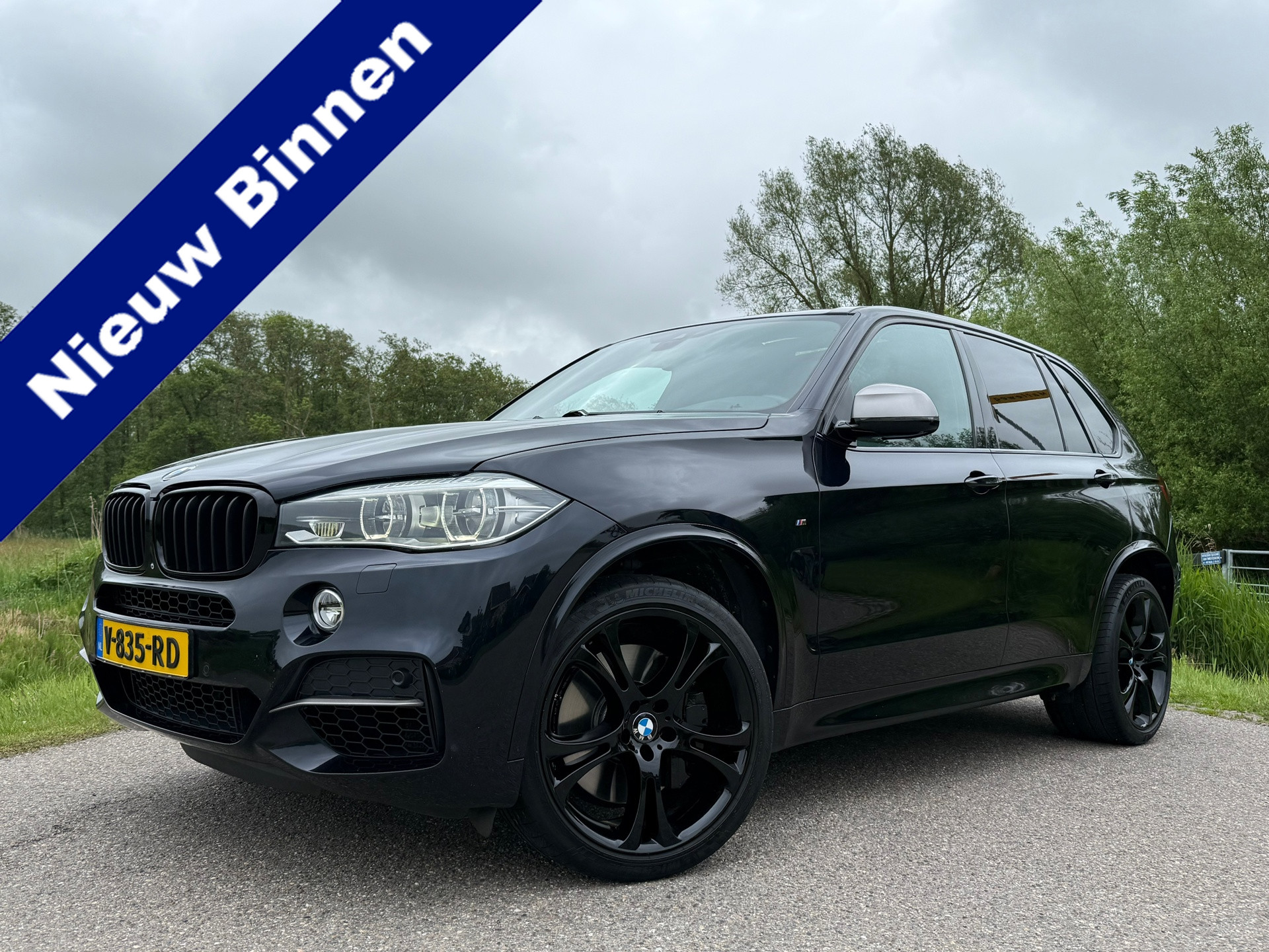Foto van BMW X5 M50D