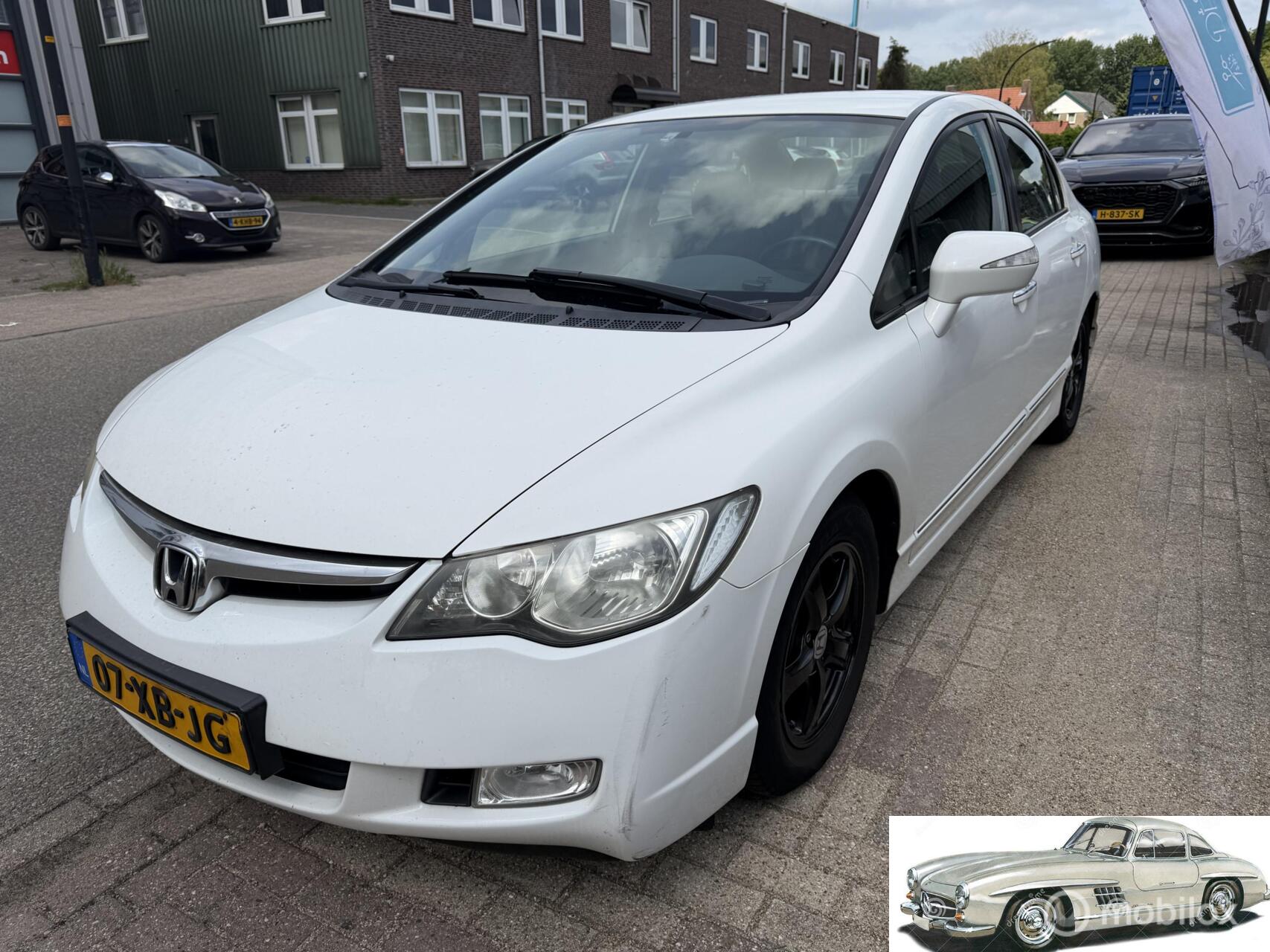 Foto van HONDA CIVIC 4DR HYBRID