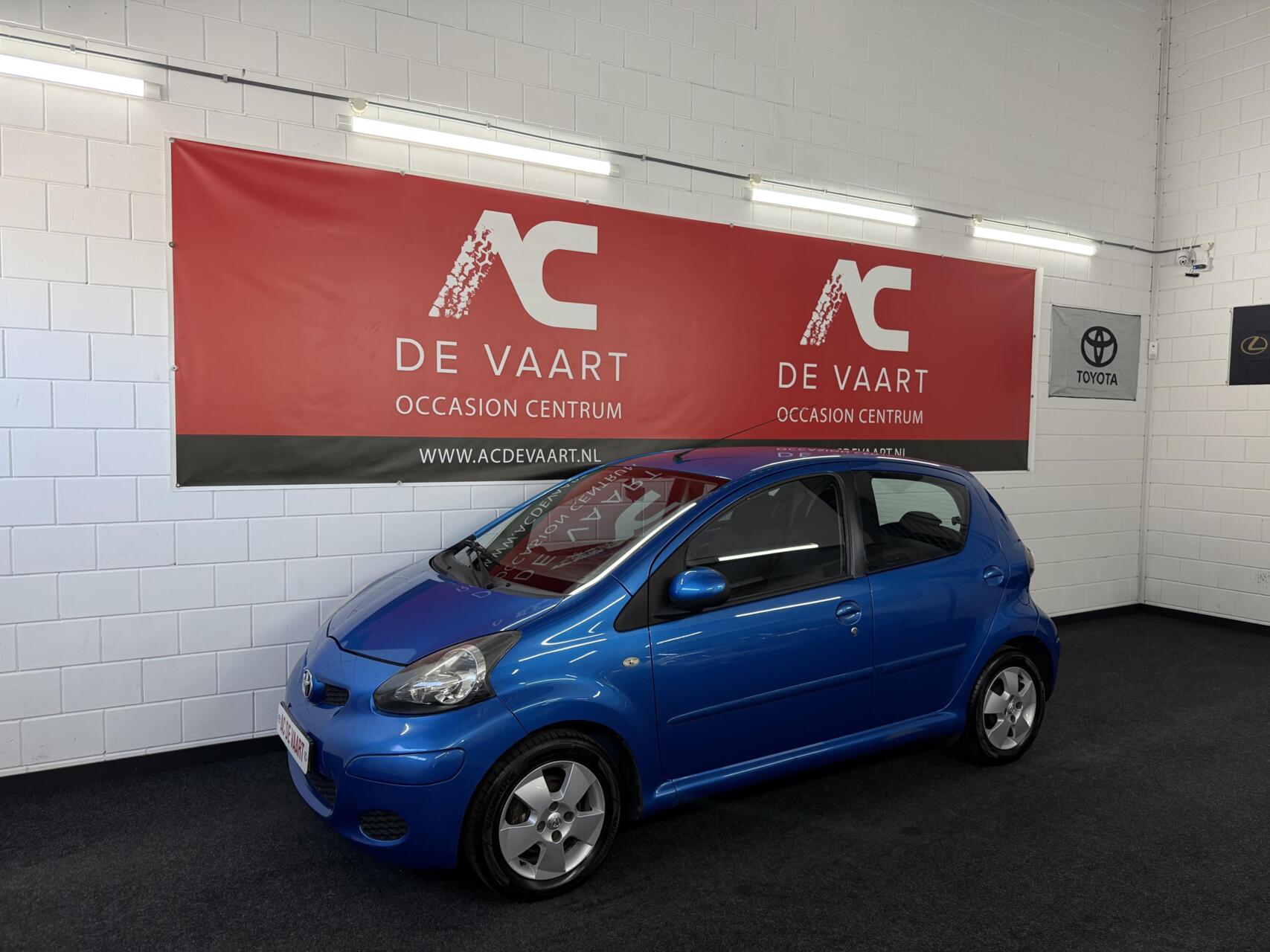 Toyota Toyota Aygo 1.0-12V Dynamic Blue - 5DEURS/AIRCO/PDC/ELEK.PAK 2009 - voorkant
