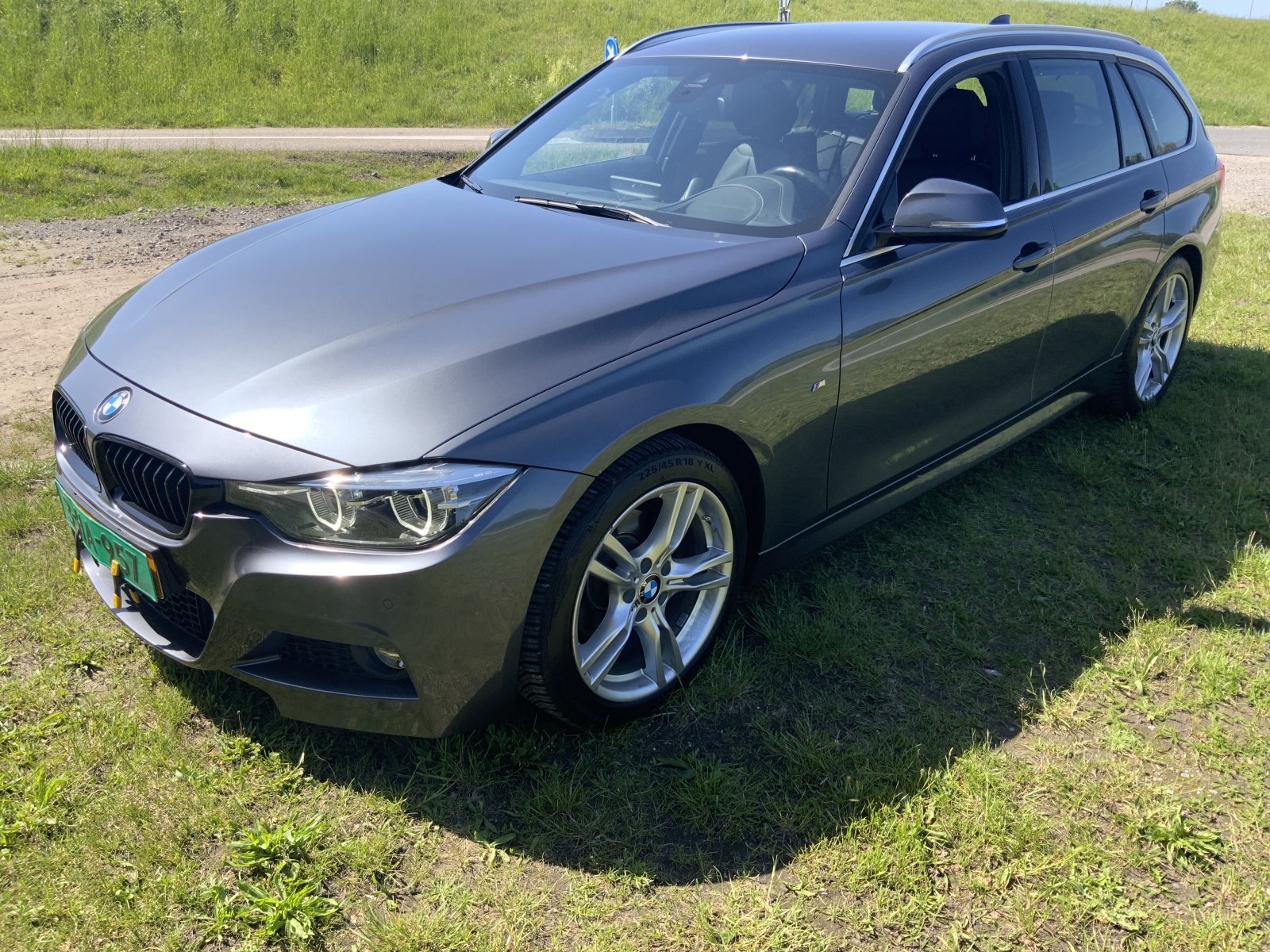BMW 3-serie Touring 320i MSp. Exec. 2018 - voorkant