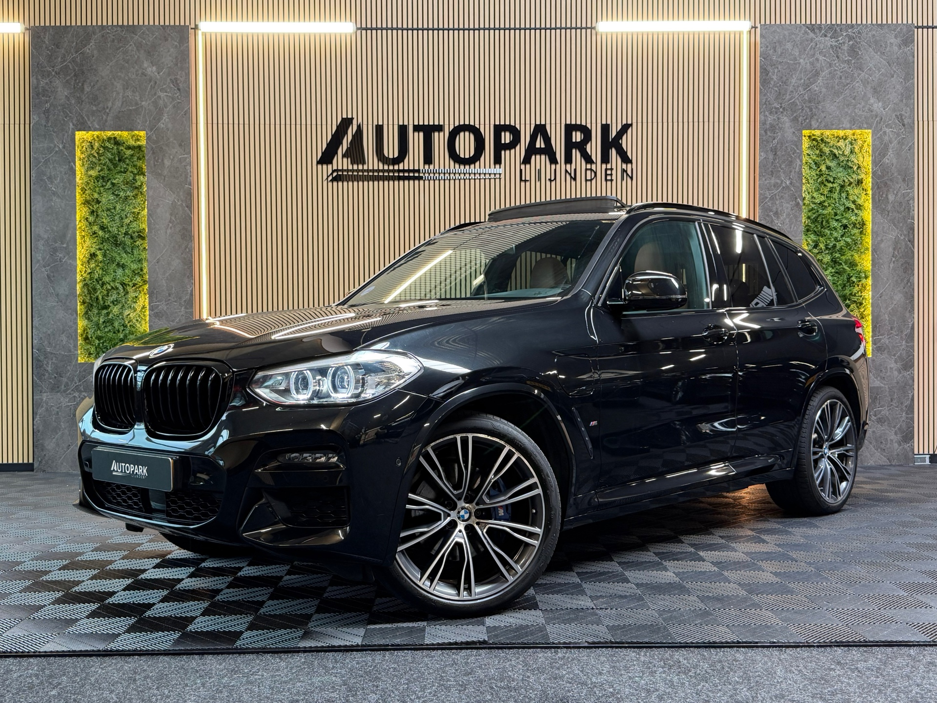 Foto van BMW X3 XDRIVE30E