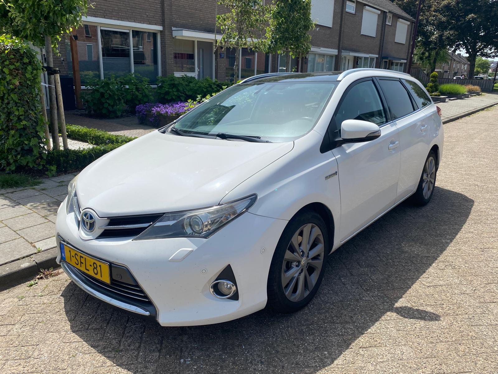 Toyota Auris Touring Sports 1.8 Hybr. Lease Pro 2013 - voorkant