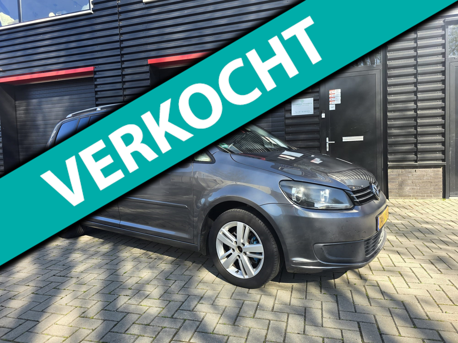 Volkswagen Touran 1.6 TDI Comfortline BlueMotion 7p. | NAVI | BLUETOOTH | CRUISE CONTROL | ELEC. PAKKET 2012 - voorkant