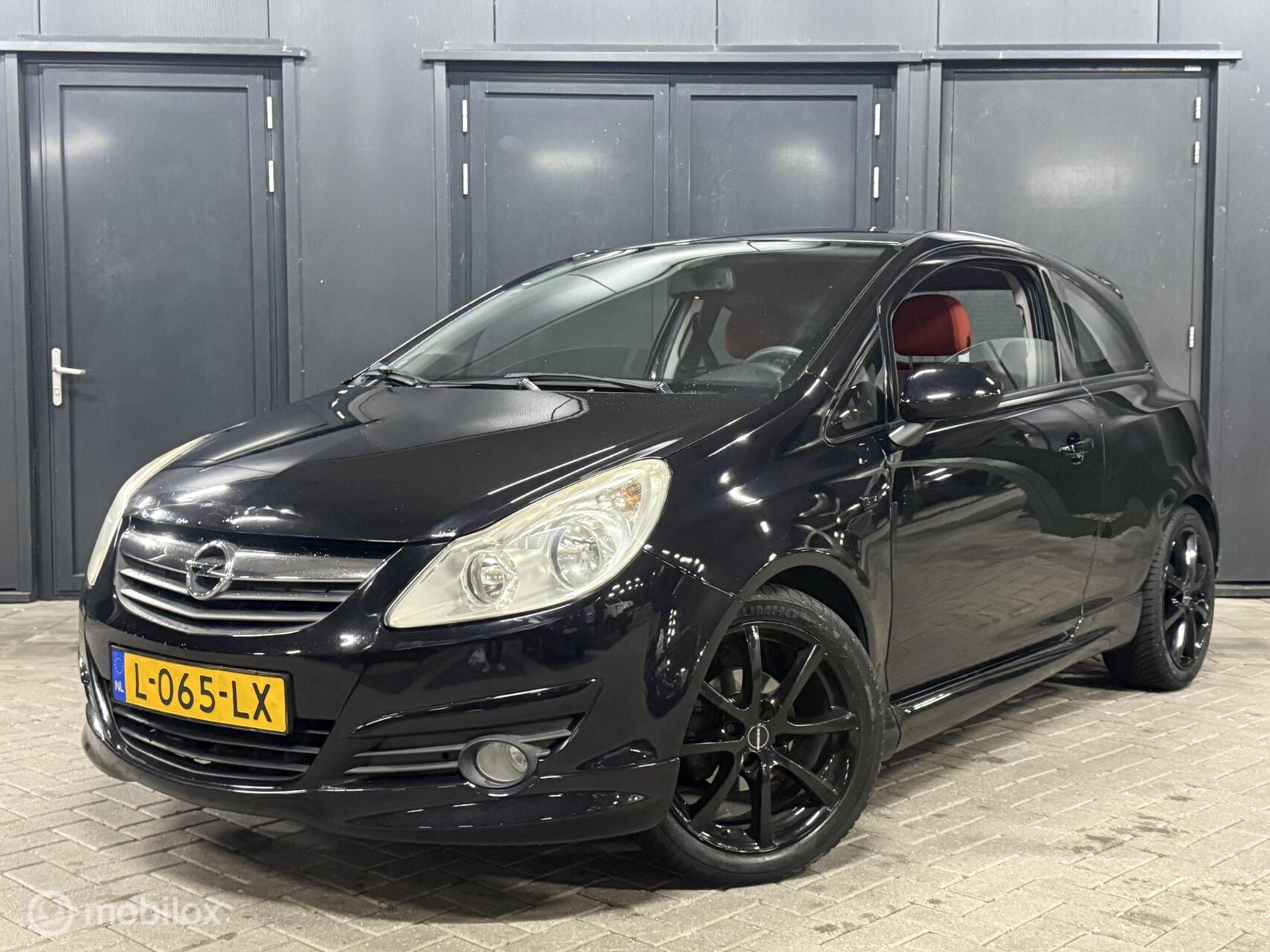 Opel Corsa 1.2-16V Sport opc pakket|carplay|beurt+apk|netjes 2009 - voorkant