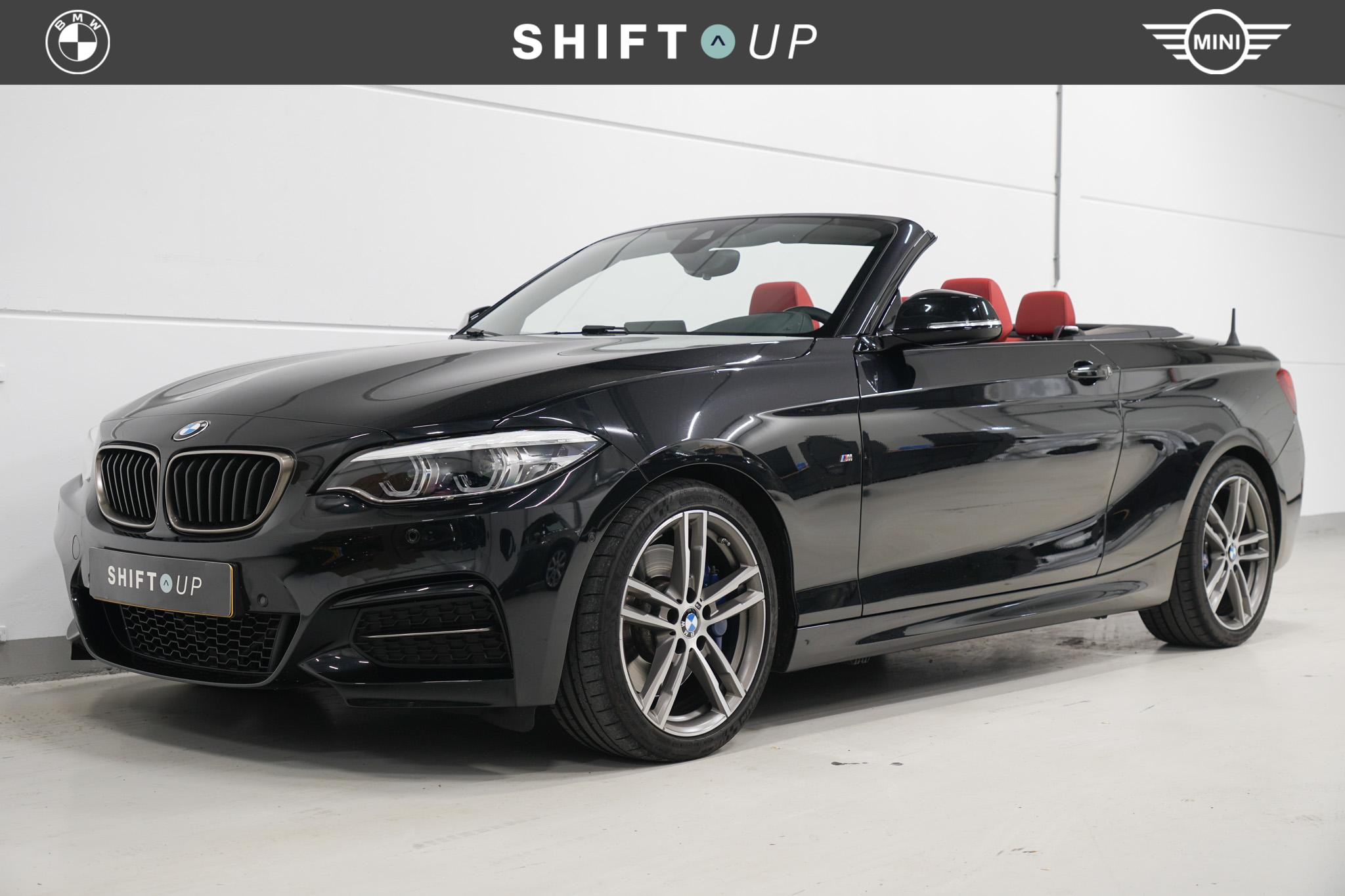 BMW 2-serie Cabrio M240i High Executive|HARMAN KARDON|MEMORYSEATS|KEYLESS|CARPLAY|SFEERVERLICHT|SHADOWLINE|340PK|DEALERONDERHOUDEN 2019 - voorkant