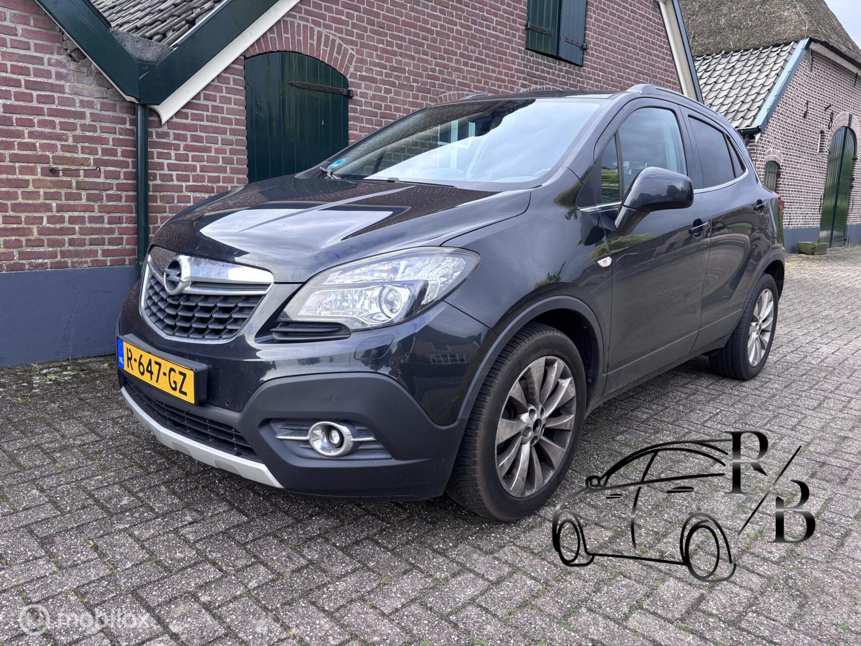 Opel Mokka 1.6 CDTi Cosmo 4x4 Lees tekst 2015 - voorkant
