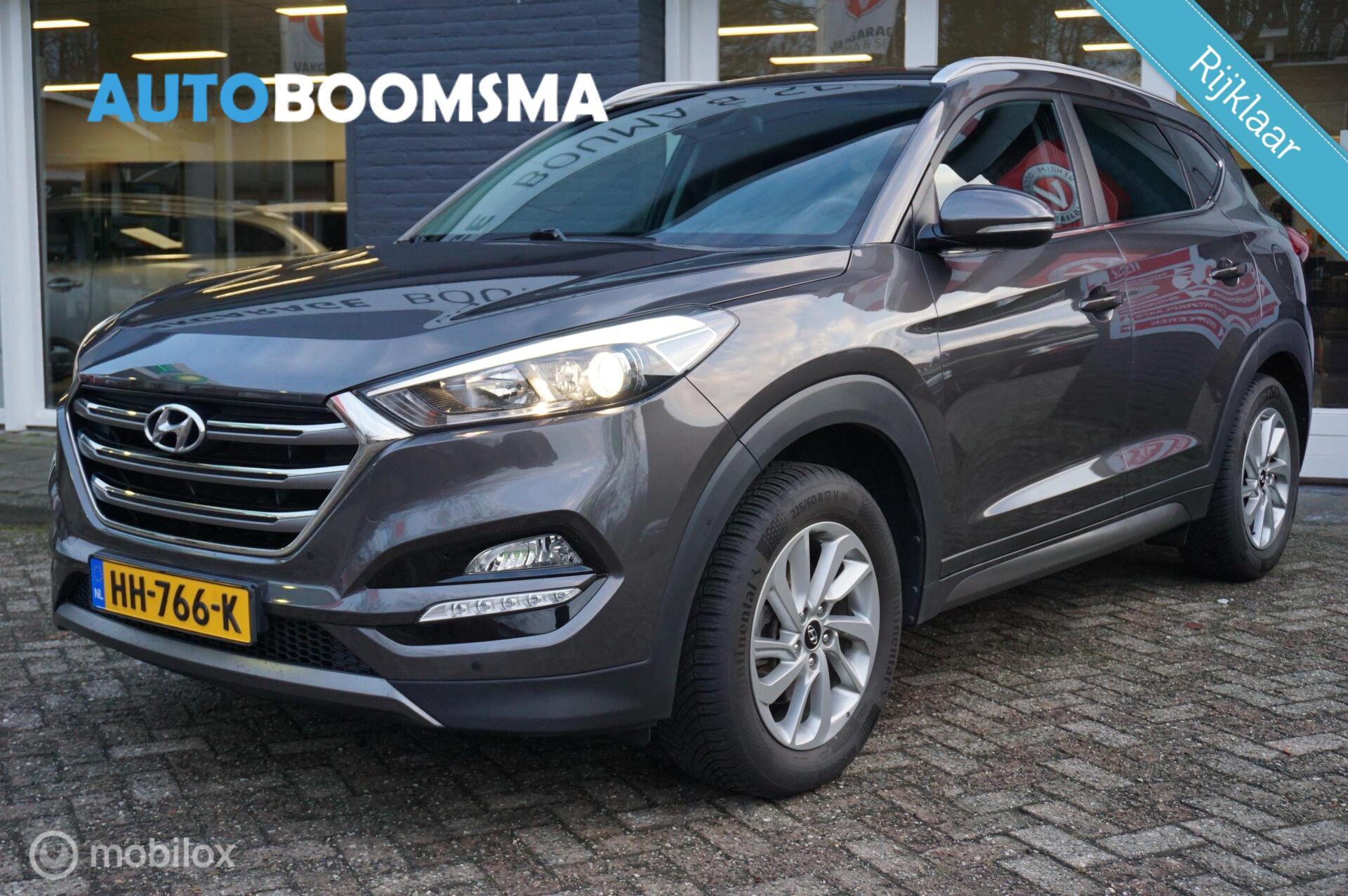 Hyundai Tucson 1.6 GDi 132pk i-Motion Clima Cruise Navi 2xPDC 2015 - voorkant