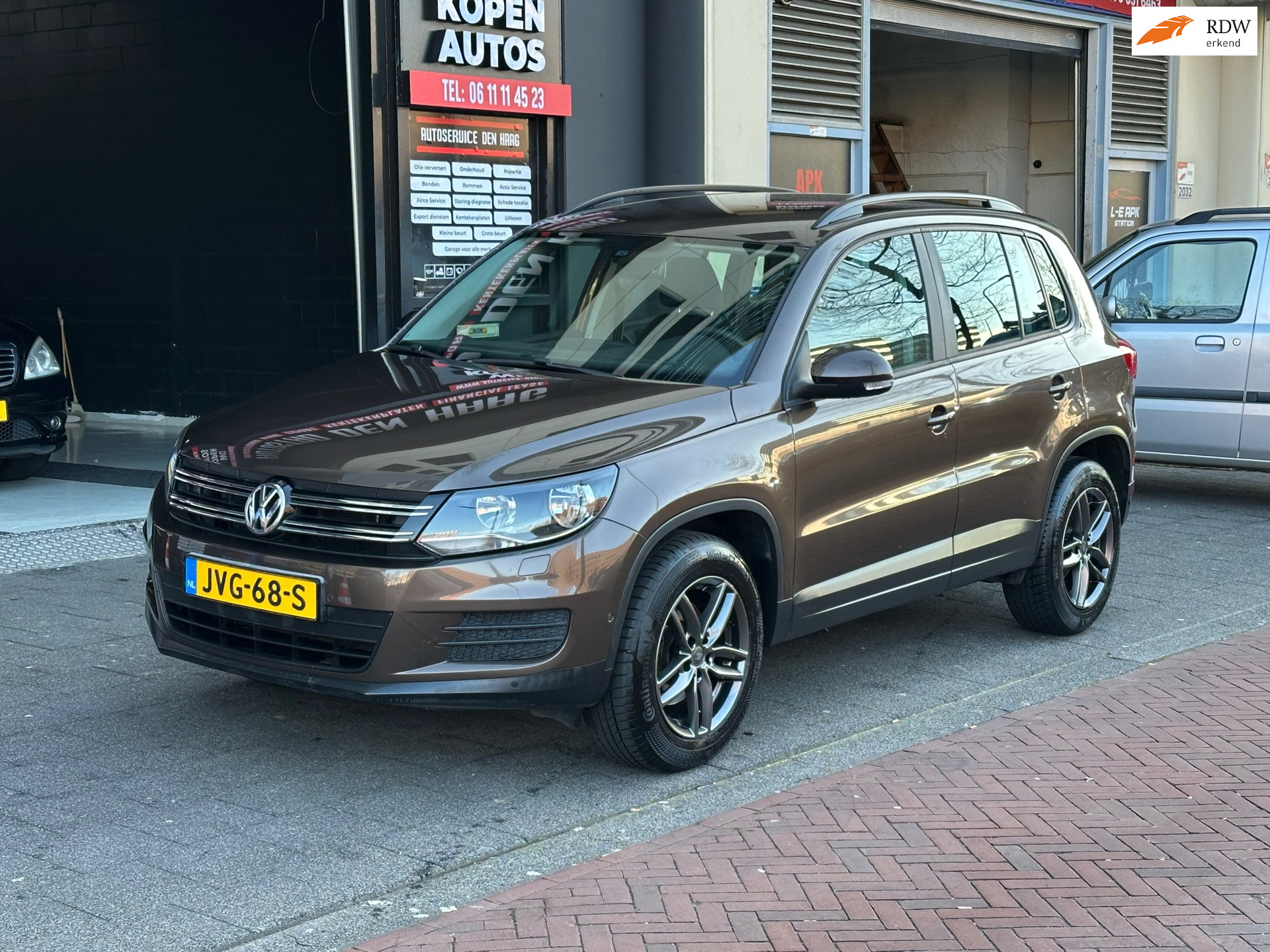 Volkswagen Tiguan 1.4 TSI Sport&Style Clima Stoelverwarming 2011 - voorkant