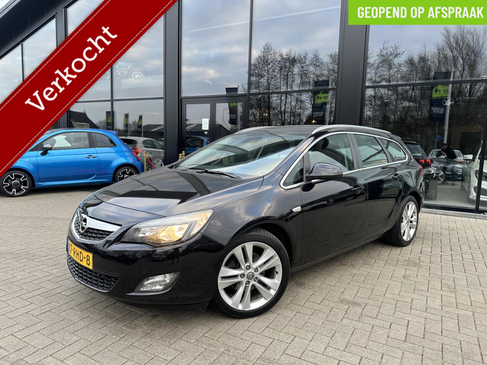 Opel Astra 1.6 Turbo Cosmo|Afn.Trekhaak|Clima|Navi 2011 - voorkant