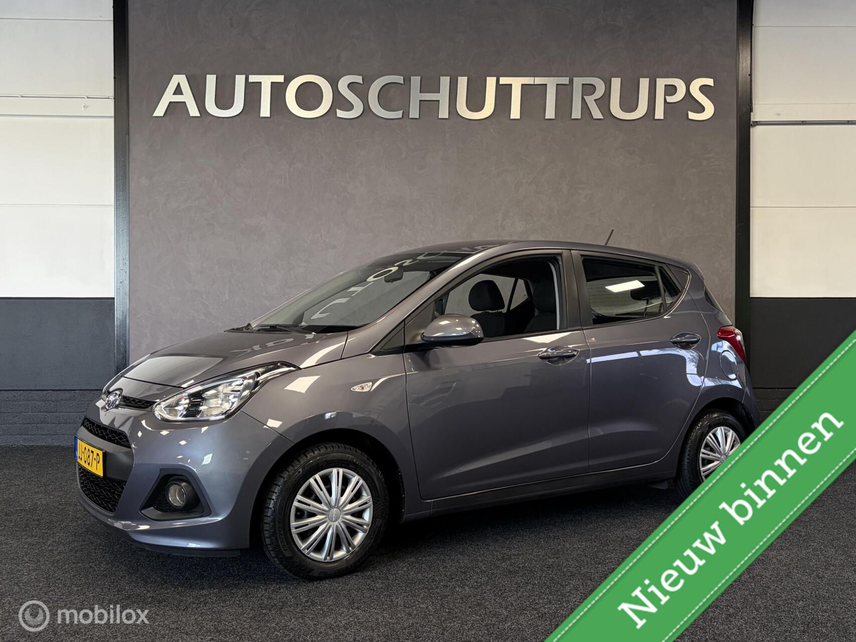 Hyundai I10 1.0i i-Motion Comfort 1E EIG / 22K KM! / UNIEK! / NAP / CLIMA / TR.HAAK / 2016 - voorkant