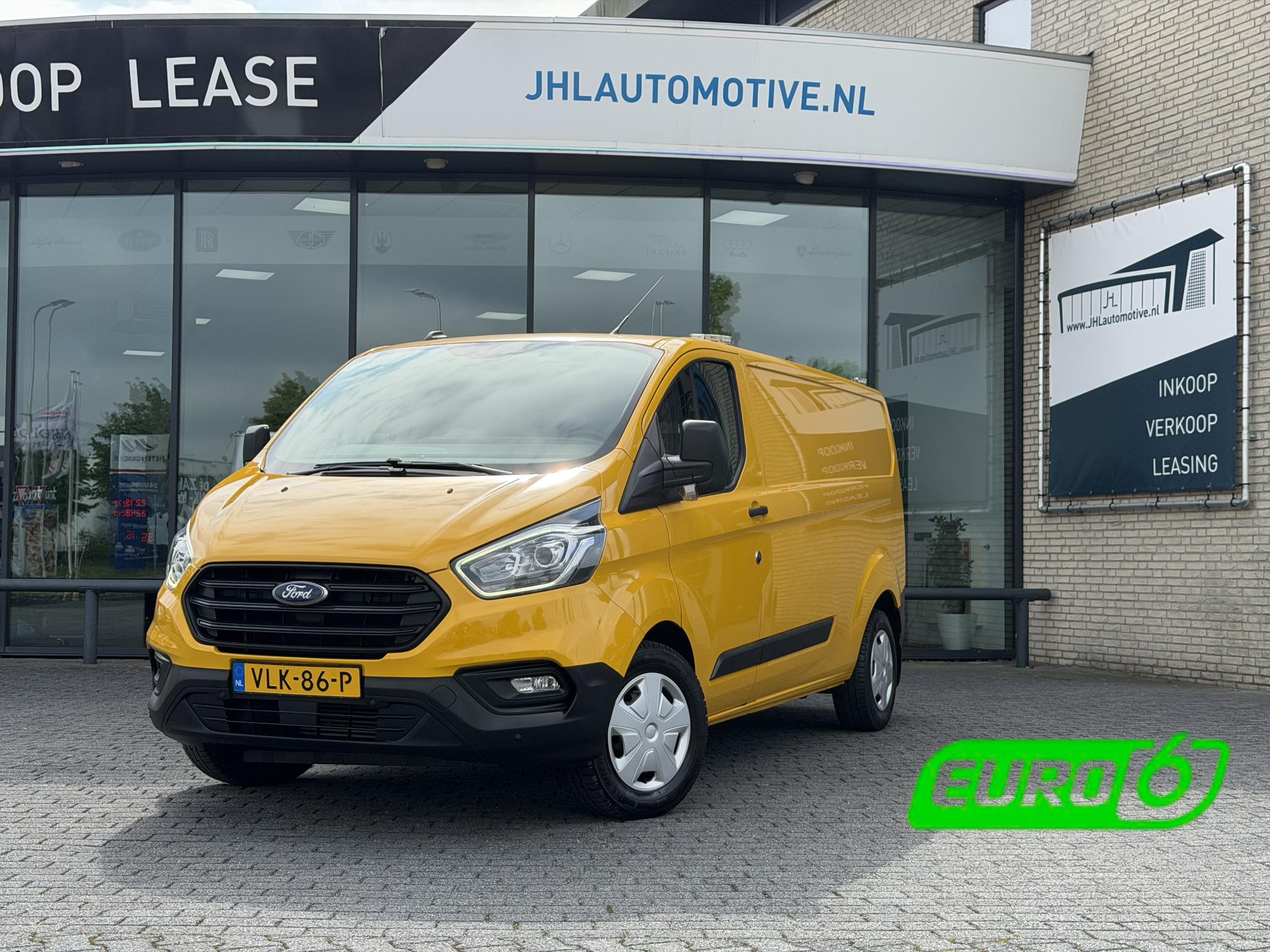 Ford Transit Custom 320 2.0 TDCI L2H1*OMVORMER*NAVI*A/C*HAAK* 2021 - voorkant