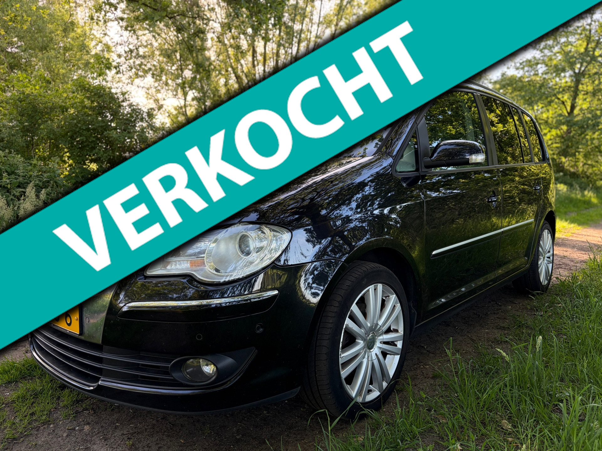 Volkswagen Touran 1.4 TSI Highline 7P!/Navi/Cruise/P.sensoren/Clima/APK NEW! 2009 - voorkant
