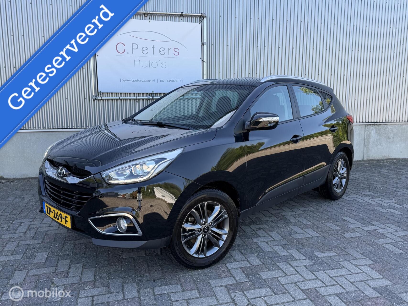 Hyundai Ix35 1.6i GDI i-Vision 2014 / Facelift Model / LED / Trekhaak / Camera / Stoelverwarming / Navigatie / NAP 2014 - voorkant