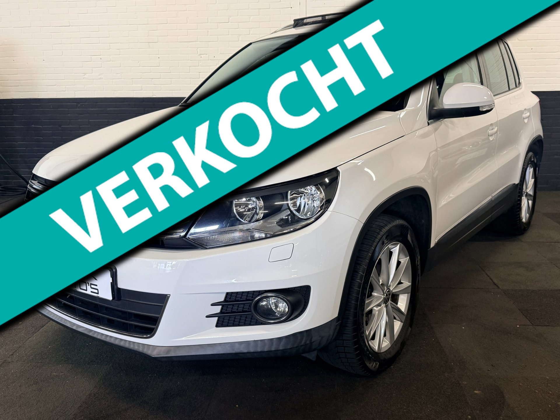 Volkswagen Tiguan Met panodak! 2012 - voorkant