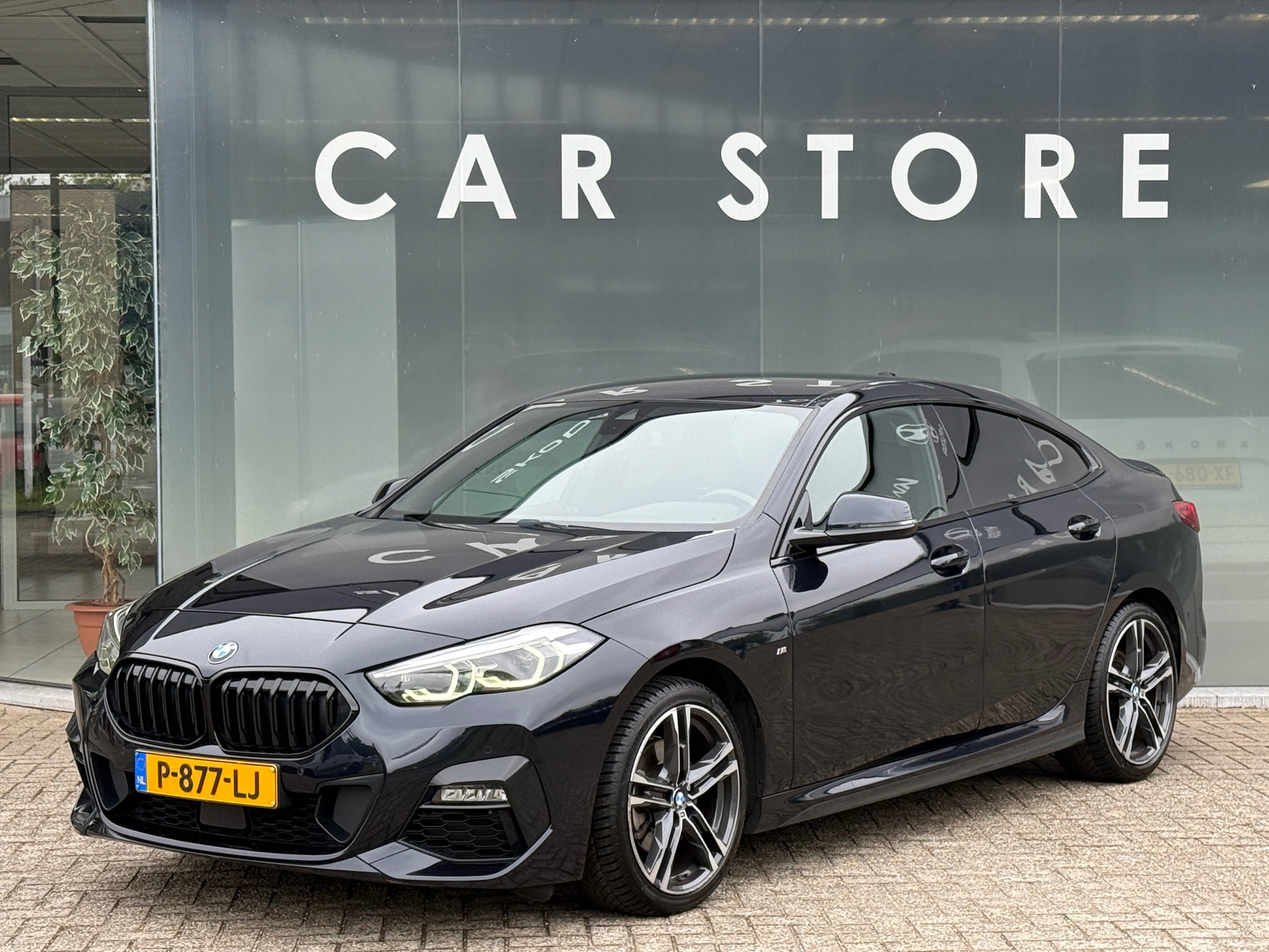 BMW 218i 218i M Sport Shadow Line Sportstoelen|Carplay|Dealer Onderhouden 2022 - voorkant