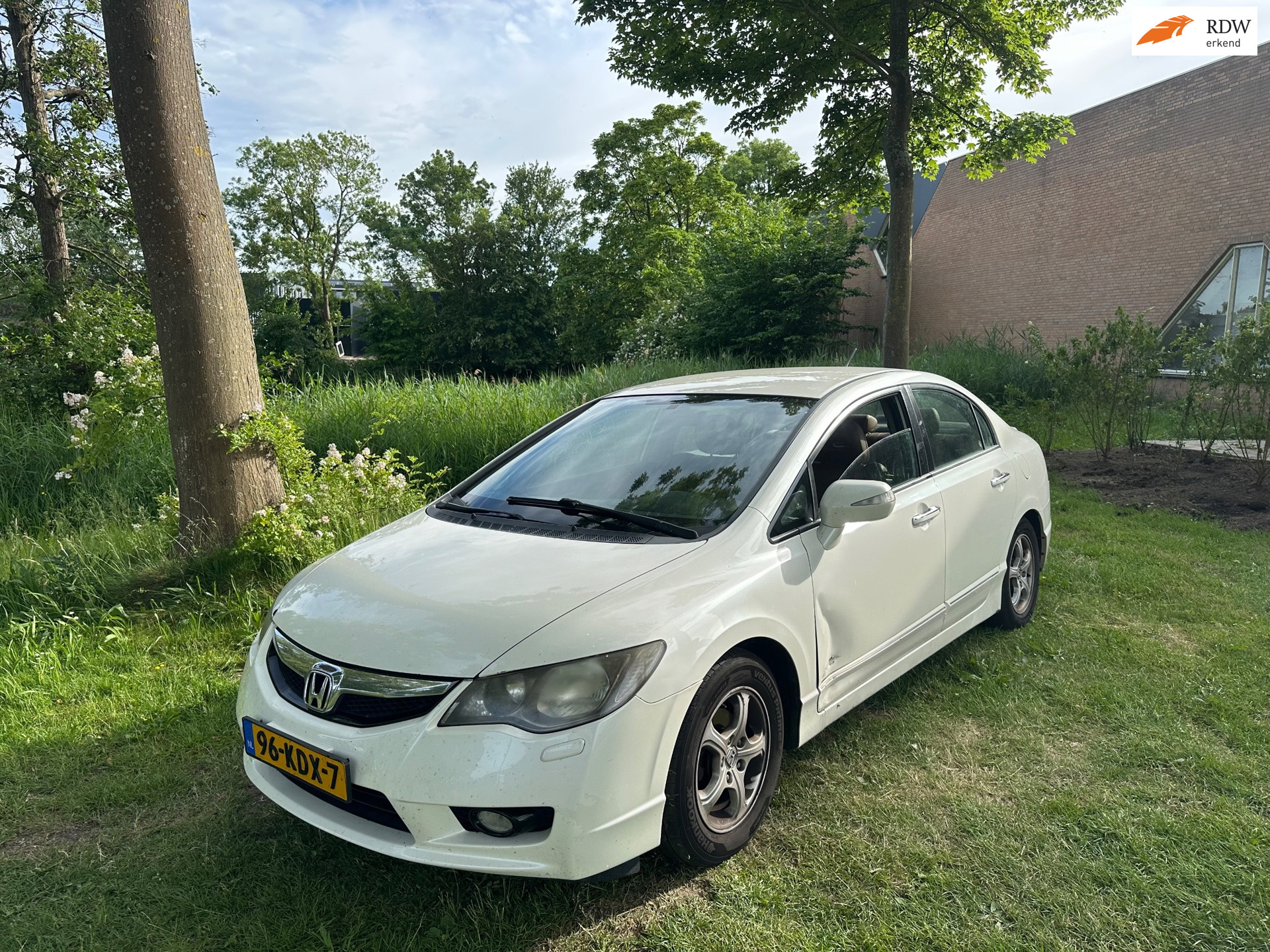 Foto van HONDA CIVIC 4DR HYBRID