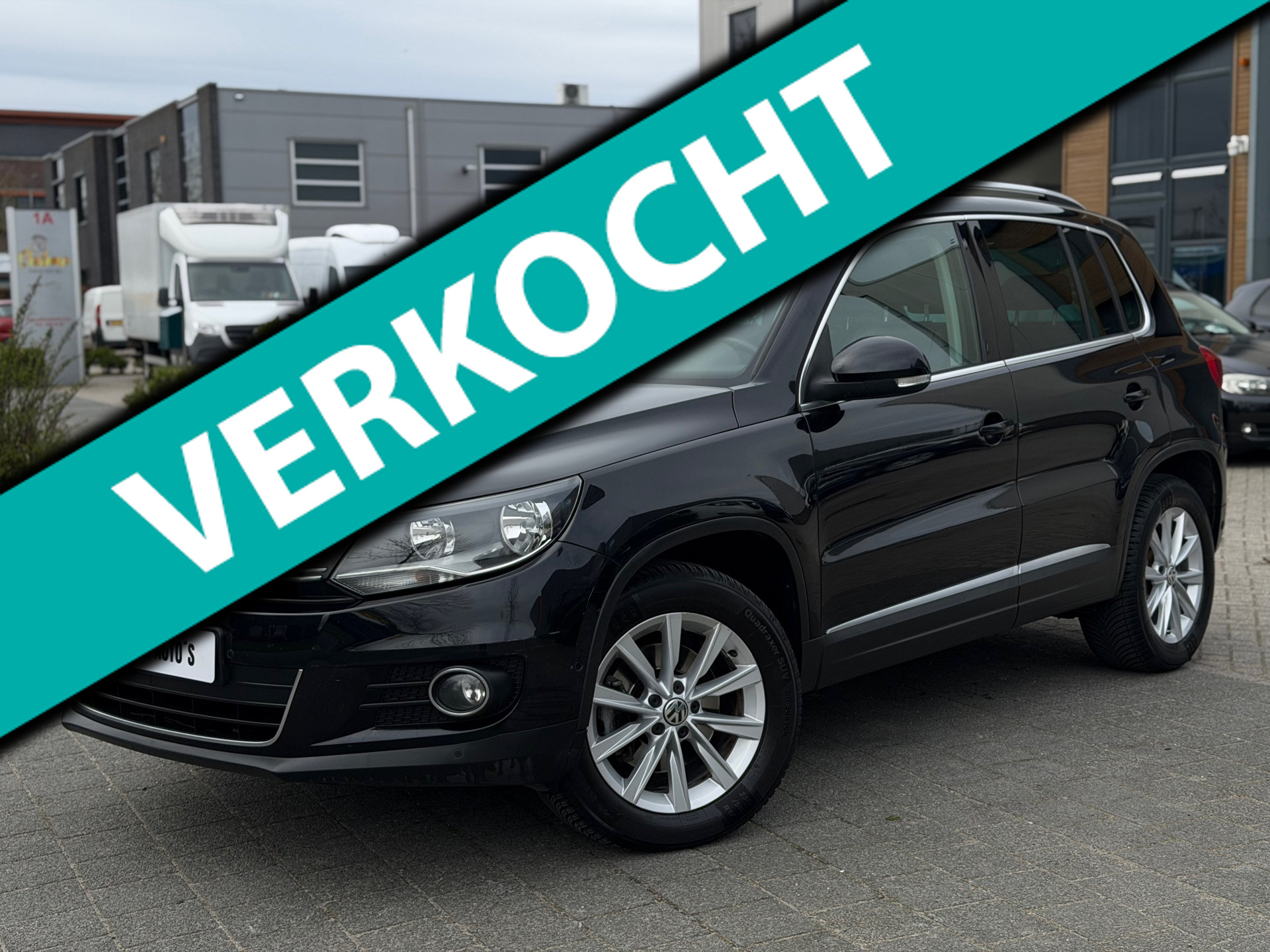 Volkswagen Tiguan 2.0 TSI Sport&Style | Automaat | Airco | NAP | Pano|Garantie 2012 - voorkant