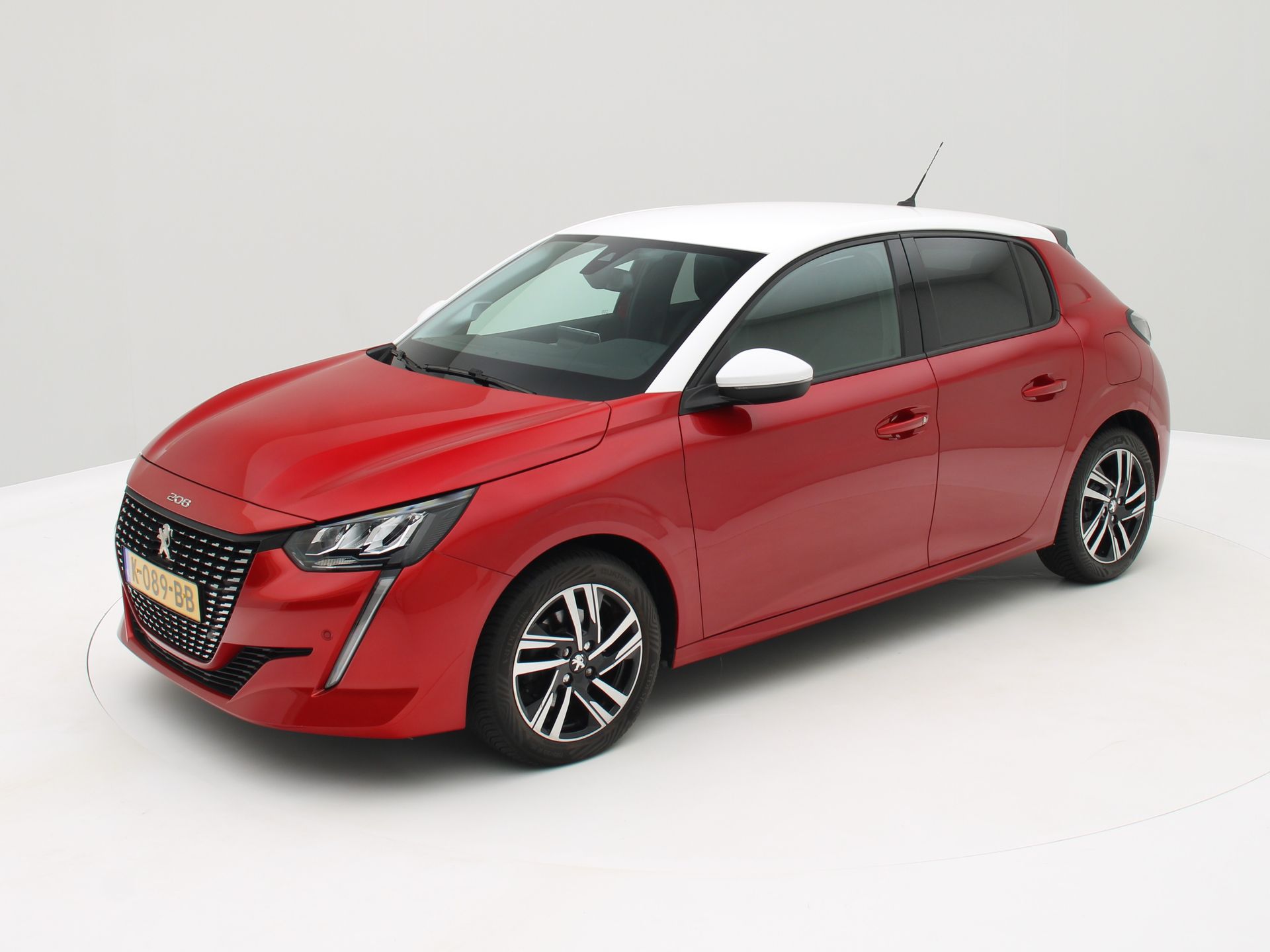 Peugeot 208 1.2 PureTech Blue Lease Allure Two Tone 103PK Origineel NL / 1e eigenaar 2020 - voorkant