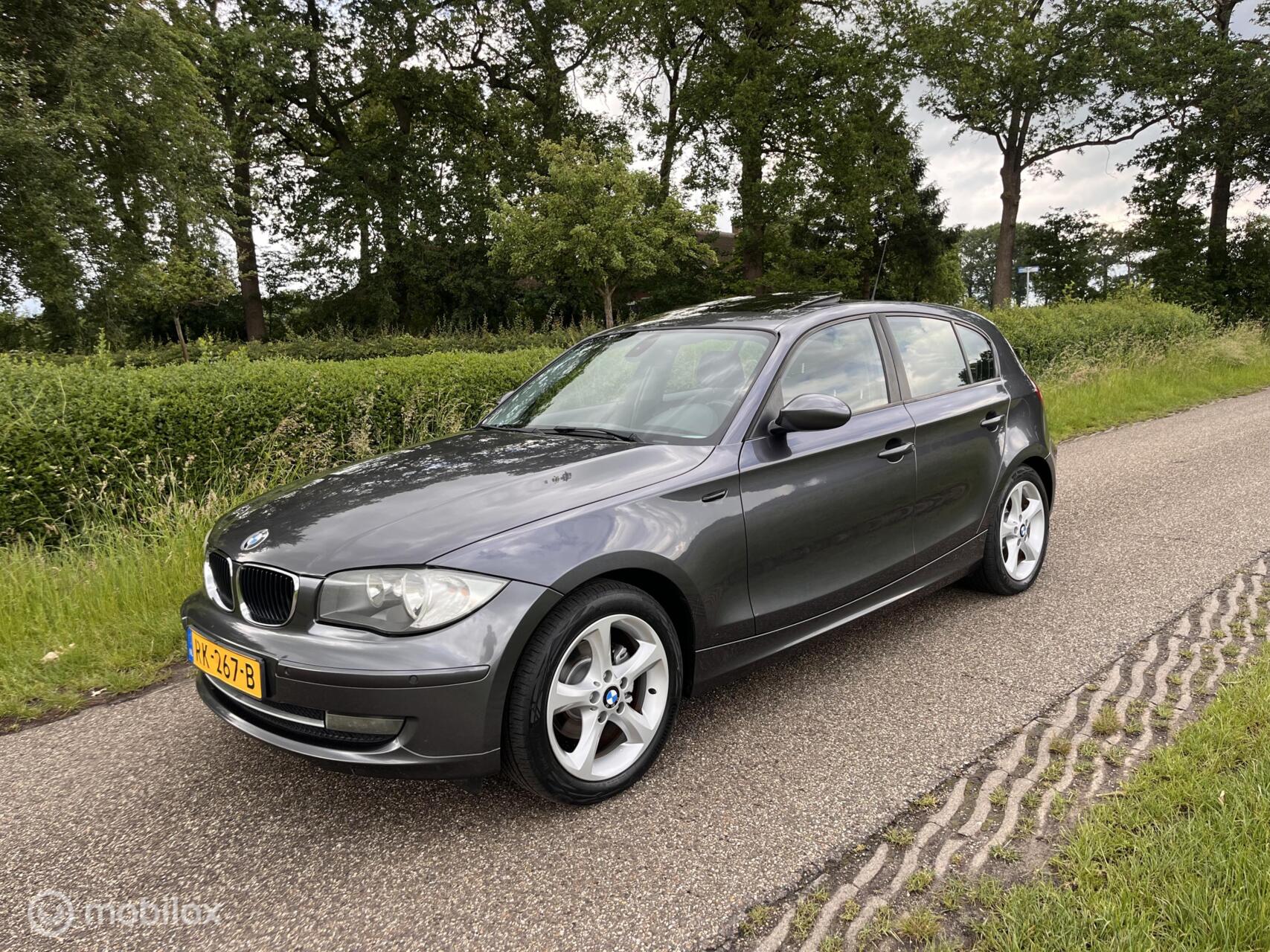 BMW 1er Reihe 118i LCI | Schuifdak | Stoelverwarming | Cruise 2008 - voorkant