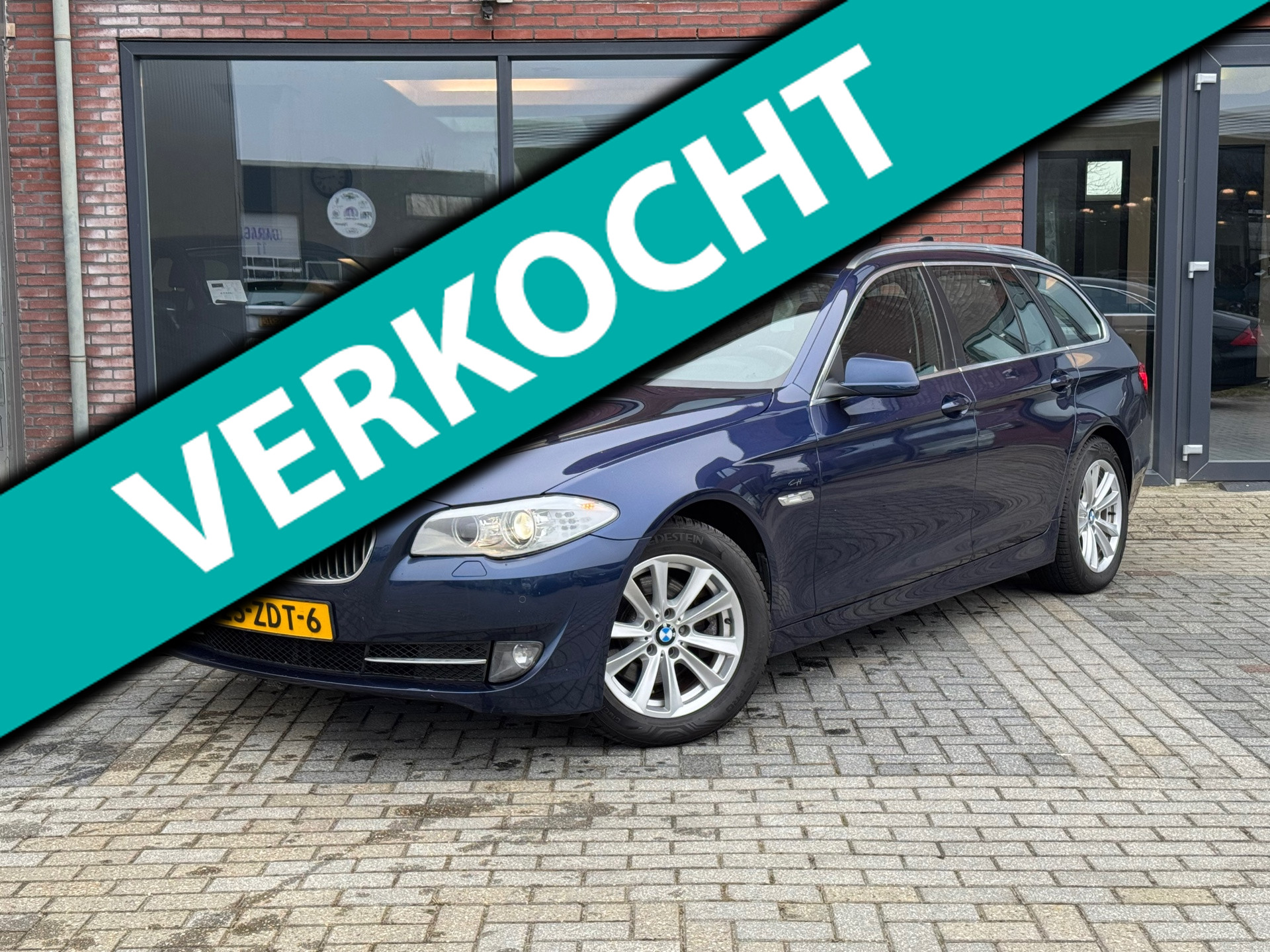 BMW 5-serie Touring 520i High Executive | Leer | Stoelverwarming | Navi | Clima | Cruise | 2012 - voorkant
